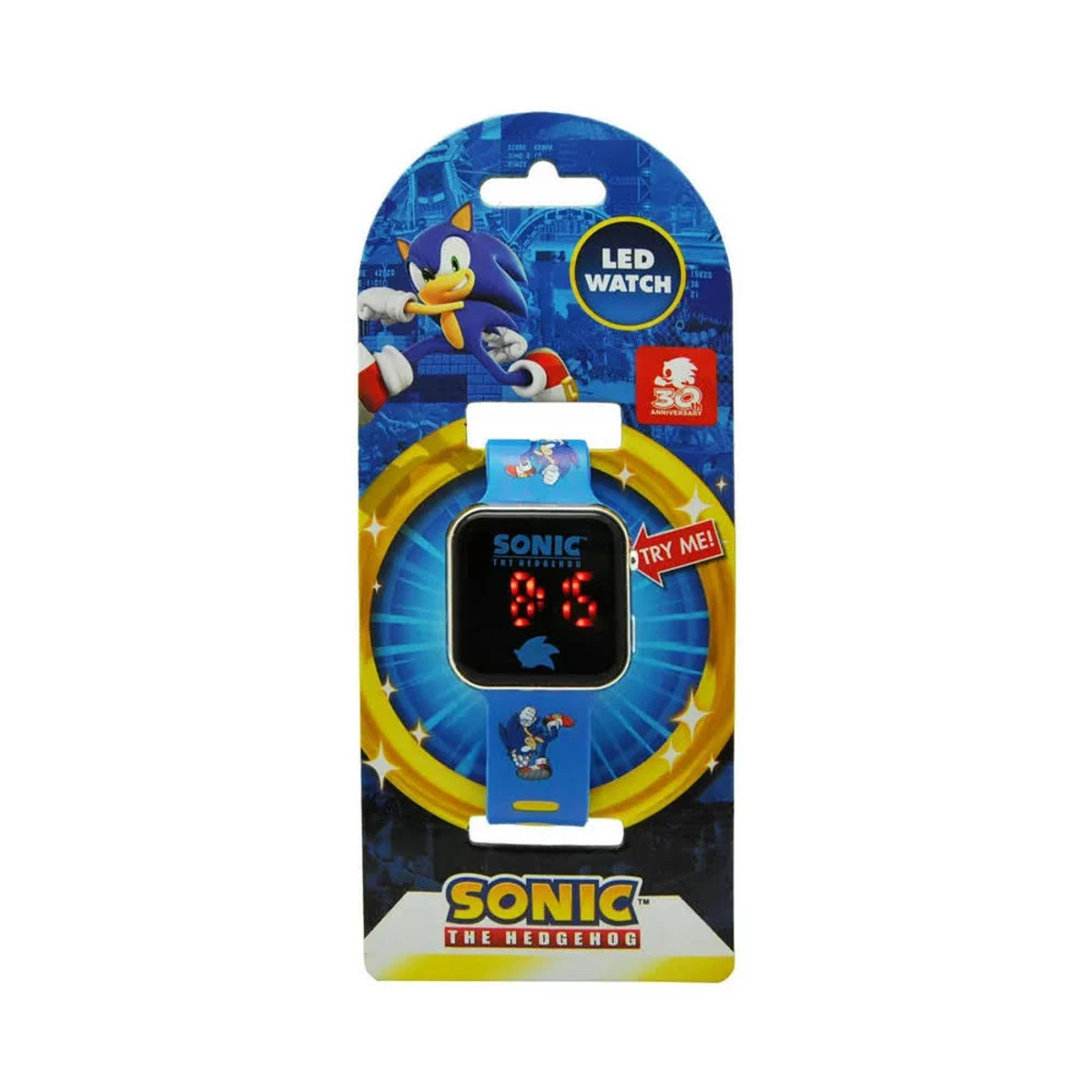 Un reloj LED de Sonic the Hedgehog. El reloj es negro con números rojos. El empaque tiene imágenes de Sonic y detalles dorados.