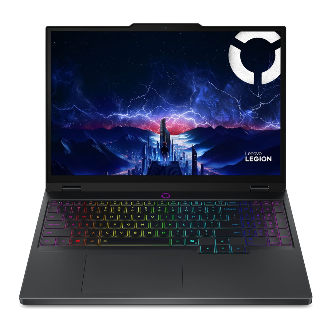 Czarny laptop Lenovo Legion z fantastyczną sceną na ekranie. Klawiatura ma kolorowe podświetlenie. Laptop stoi na białej powierzchni.