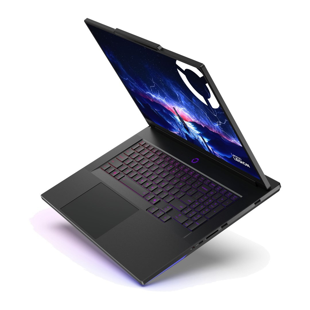 Czarny laptop z fioletowym podświetleniem klawiatury, ekran z kosmiczną sceną. Laptop jest lekko otwarty, widoczne logo marki.