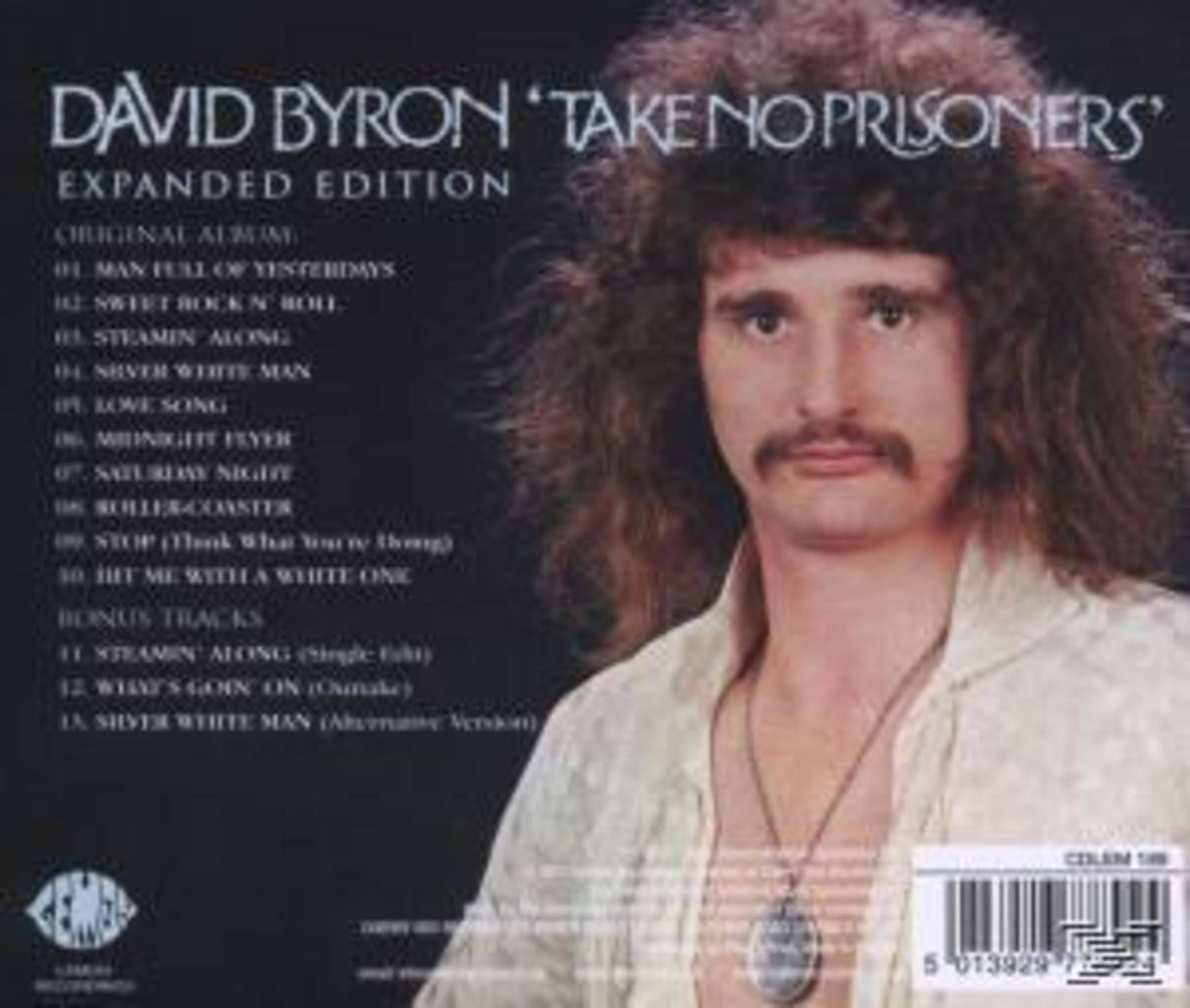 Albumcover: David Byron mit langen Haaren und Schnurrbart. Text: Take No Prisoners, Expanded Edition, und Songtitel.