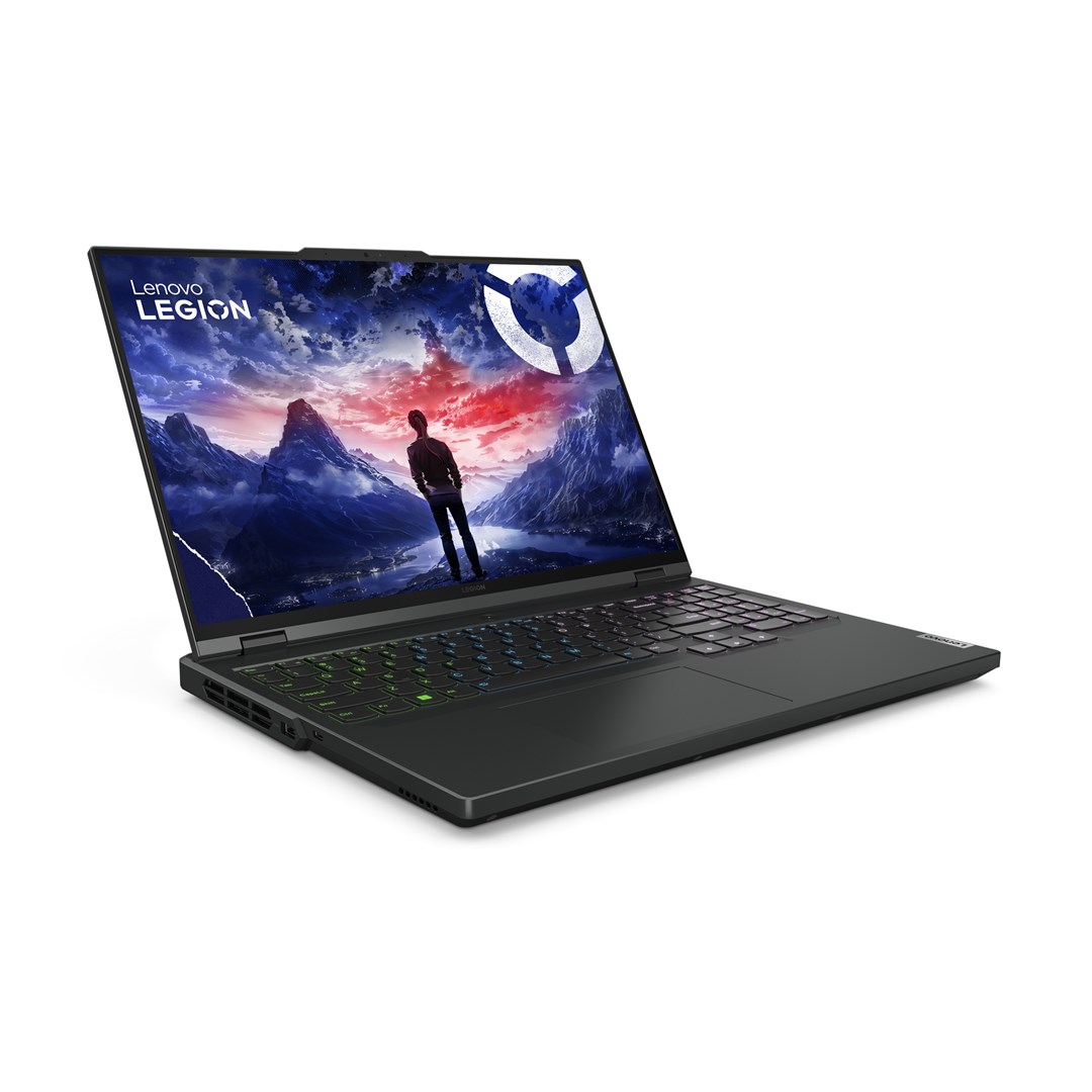 Laptop Lenovo Legion wyświetla górską scenerię z postacią. Laptop jest czarny, otwarty i na białym tle.