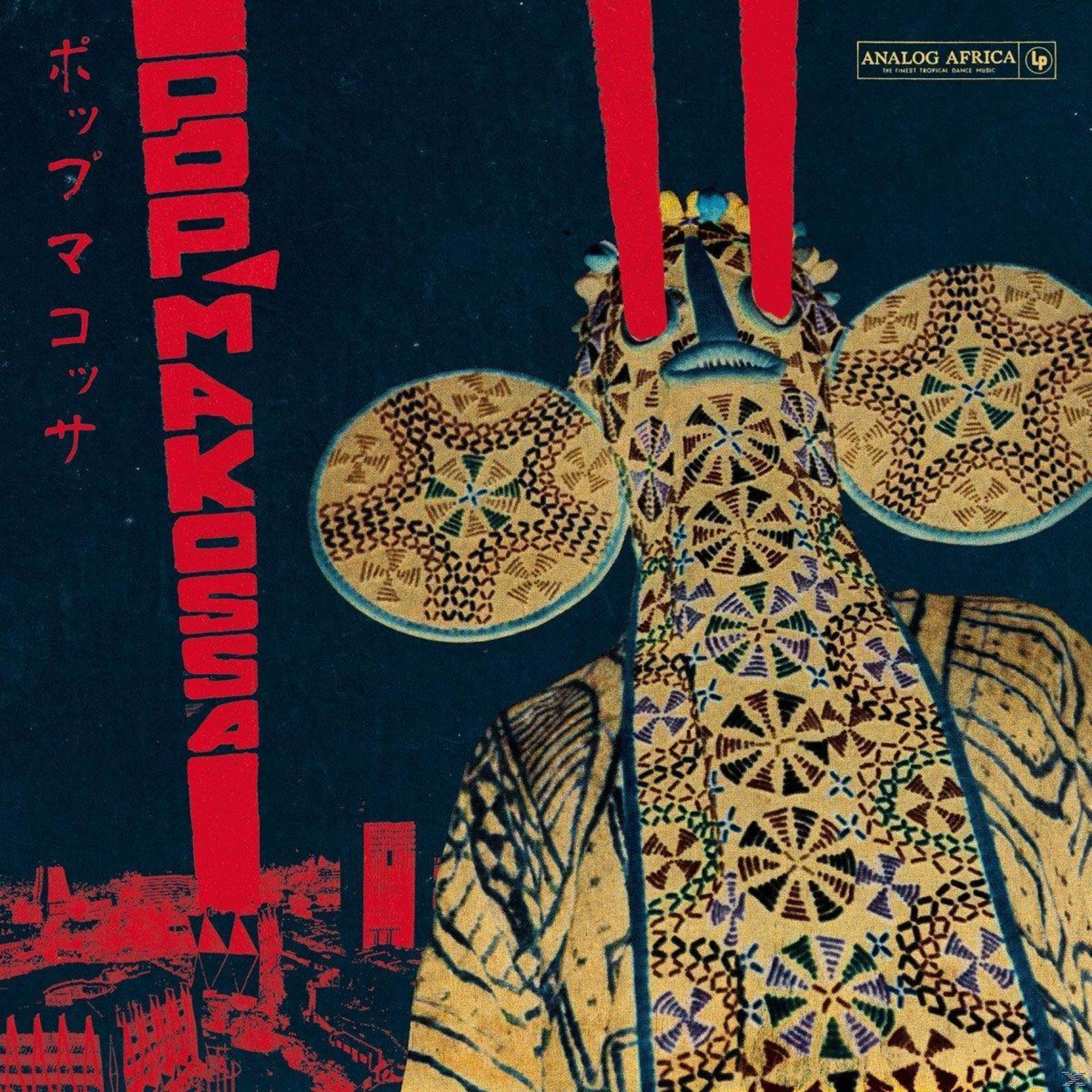 Albumcover: eine gemusterte Maske, roter Text und Stadtsilhouette auf Dunkelblau. Oben zwei rote Linien.
