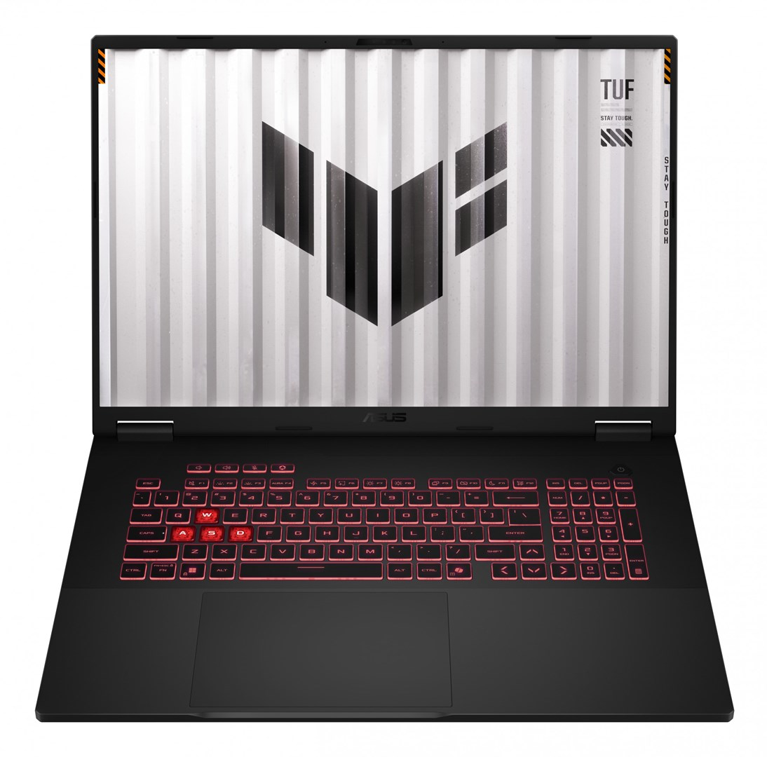 Czarny laptop otwarty. Ekran wyświetla logo i tekst. Klawiatura świeci na czerwono. 'ASUS' napisane. 'TUF STAY TOUGH' na ekranie.