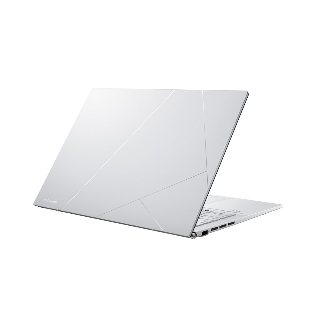 Biały laptop jest lekko otwarty, pokazując tył. Projekt zawiera geometryczne linie i logo ASUS Zenbook.