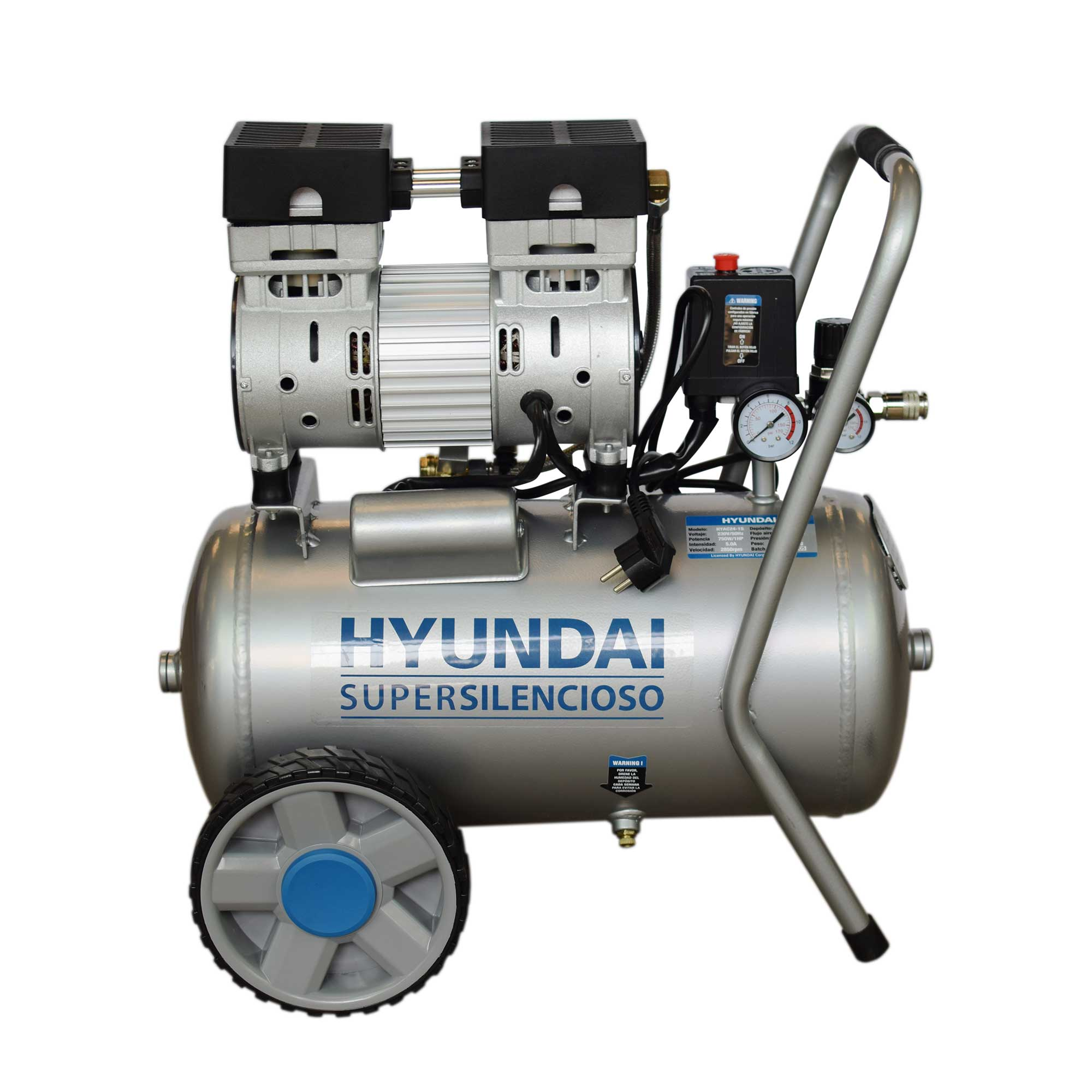 Un compresor de aire Hyundai plateado. Tiene un tanque, dos motores, un asa y un indicador. Está sobre ruedas.