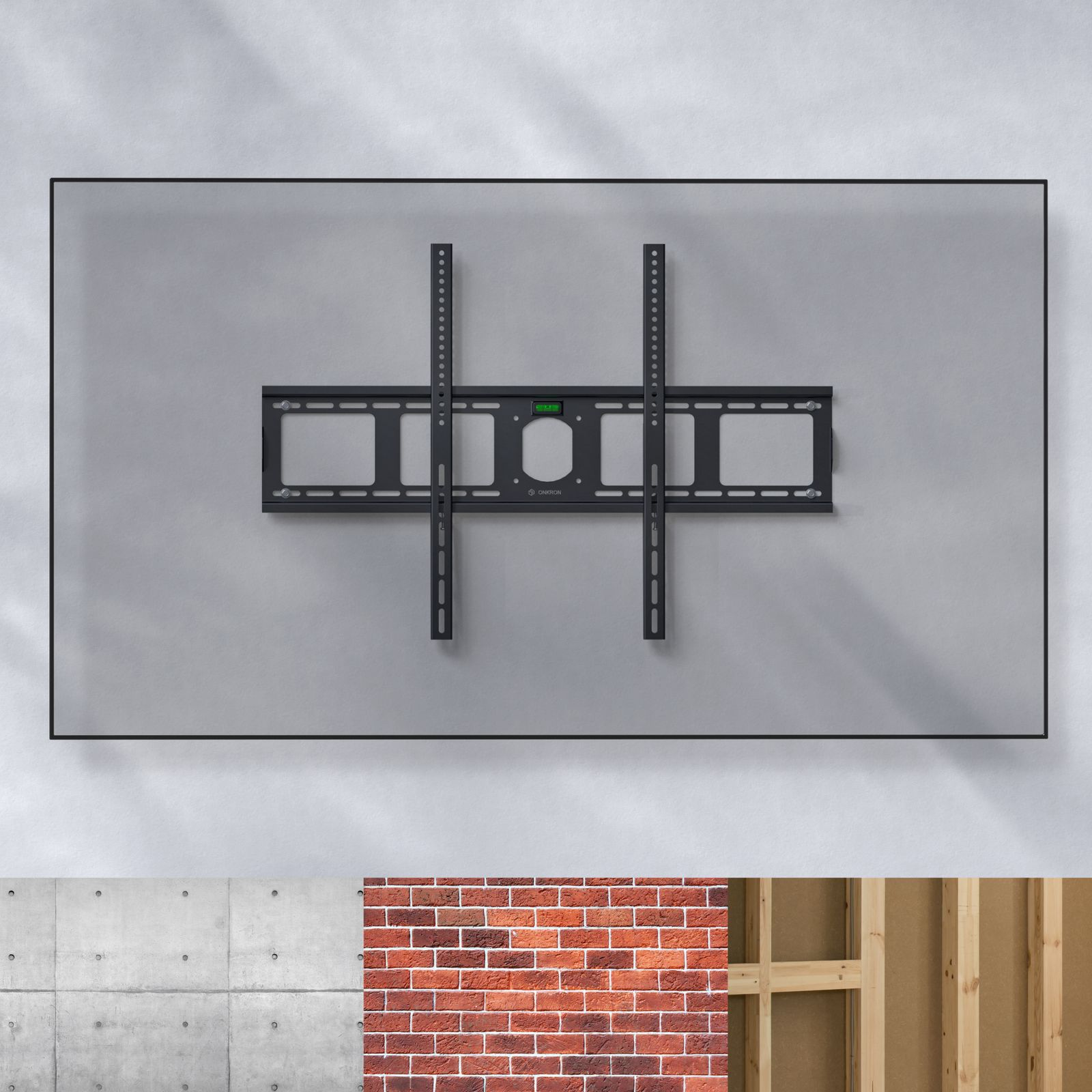 Czarny uchwyt do telewizora jest zamontowany na szarej ścianie. Poniżej znajdują się fragmenty betonu, cegły i drewnianej ramy.