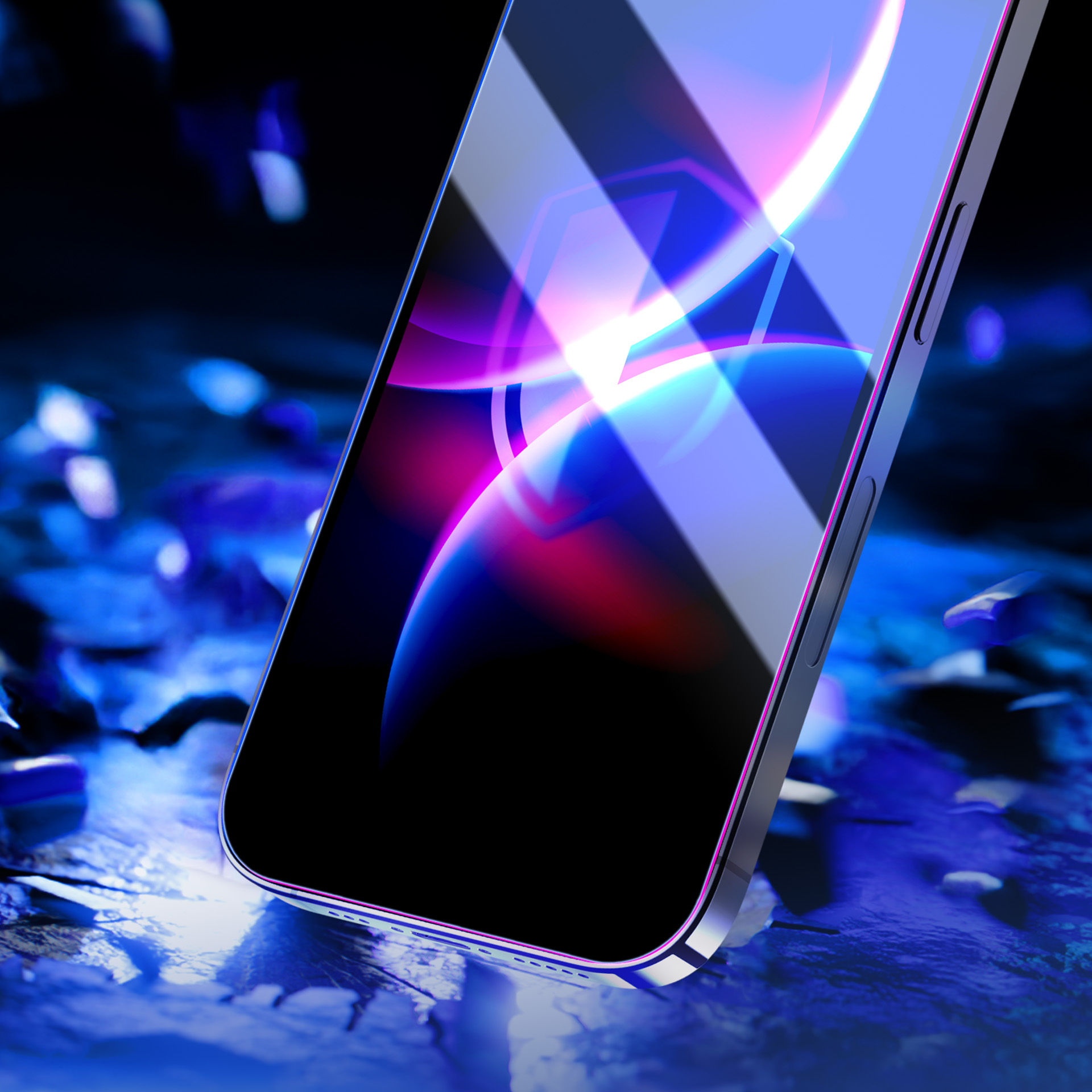 Smartfon z czarnym ekranem i kolorowym, abstrakcyjnym wyświetlaczem, spoczywający na teksturowanej, niebieskiej powierzchni z rozrzuconymi odłamkami.