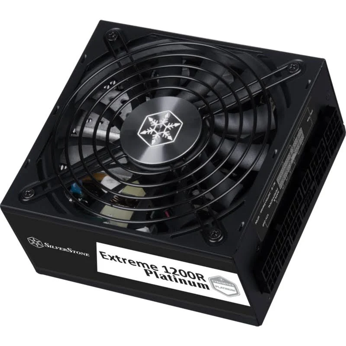 Una fuente de alimentación para computadora negra con un ventilador y una etiqueta que dice 'Extreme 1200R Platinum'. El ventilador tiene una rejilla metálica.