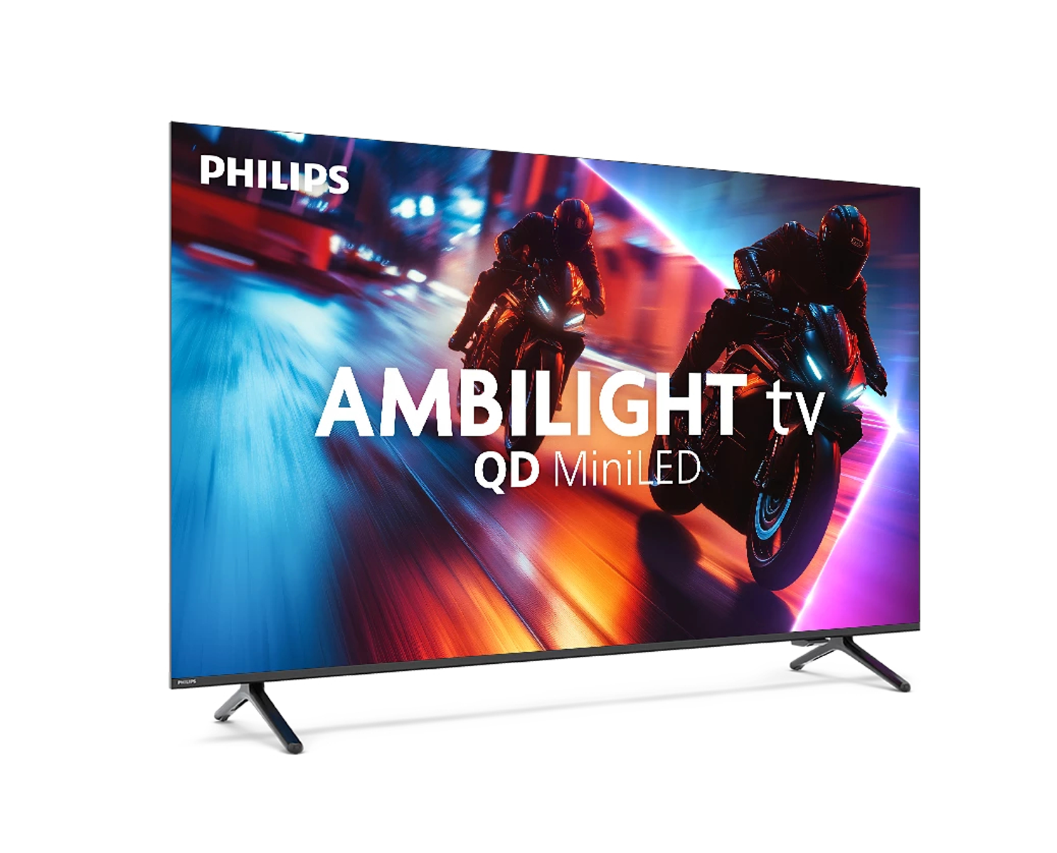 Telewizor Philips Ambilight. Motocykle ścigają się po ekranie. Wyświetlacz ma cienką czarną ramkę i czarne nogi. Białe tło.