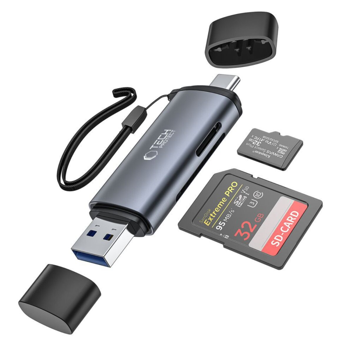 Un hub USB-C grigio con porta USB, scheda SD e microSD e due tappi neri. Sono presenti anche due schede di memoria.