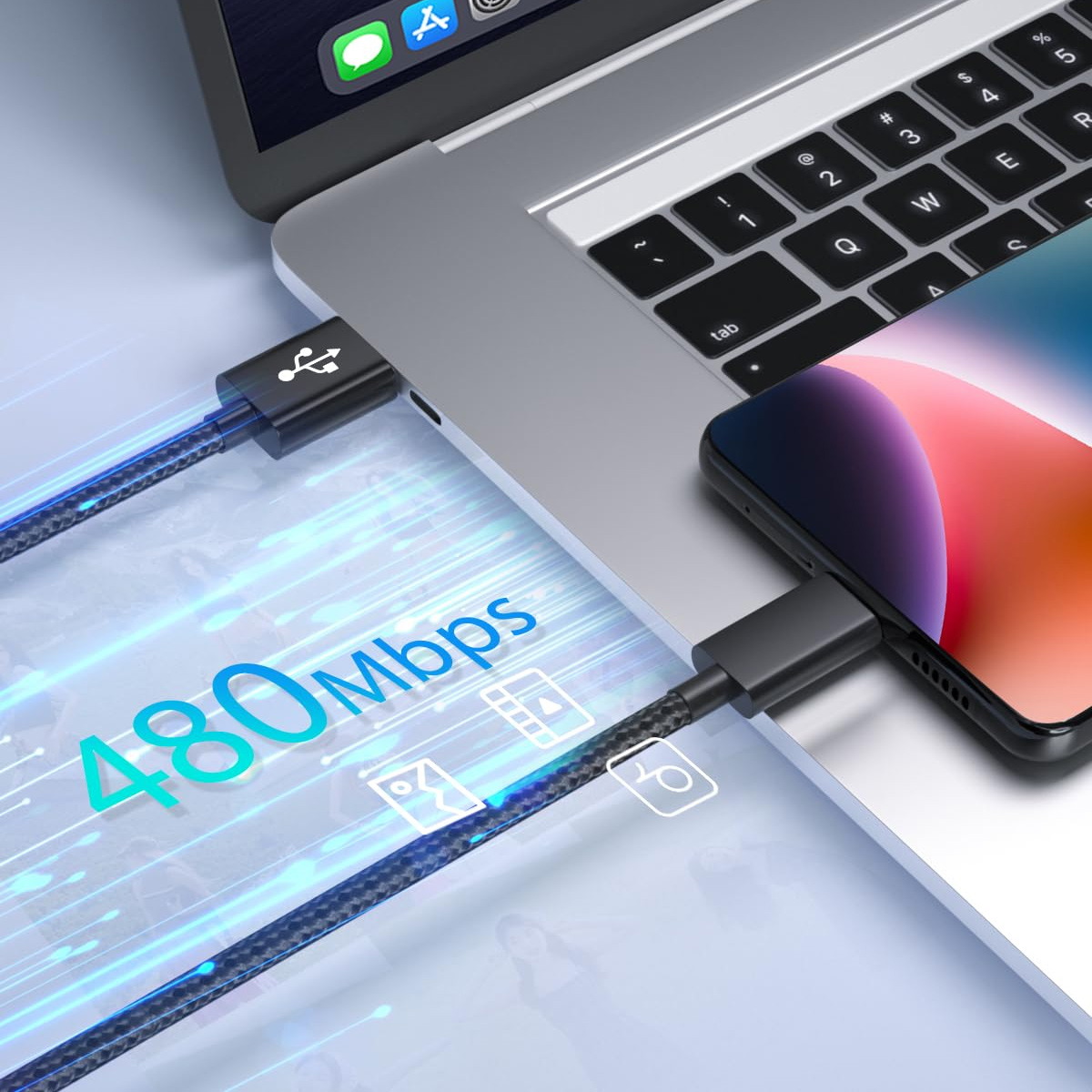Ein Laptop und ein Smartphone sind über USB-Kabel verbunden. Das Bild zeigt eine Datenübertragungsgeschwindigkeit von 480 Mbit/s.