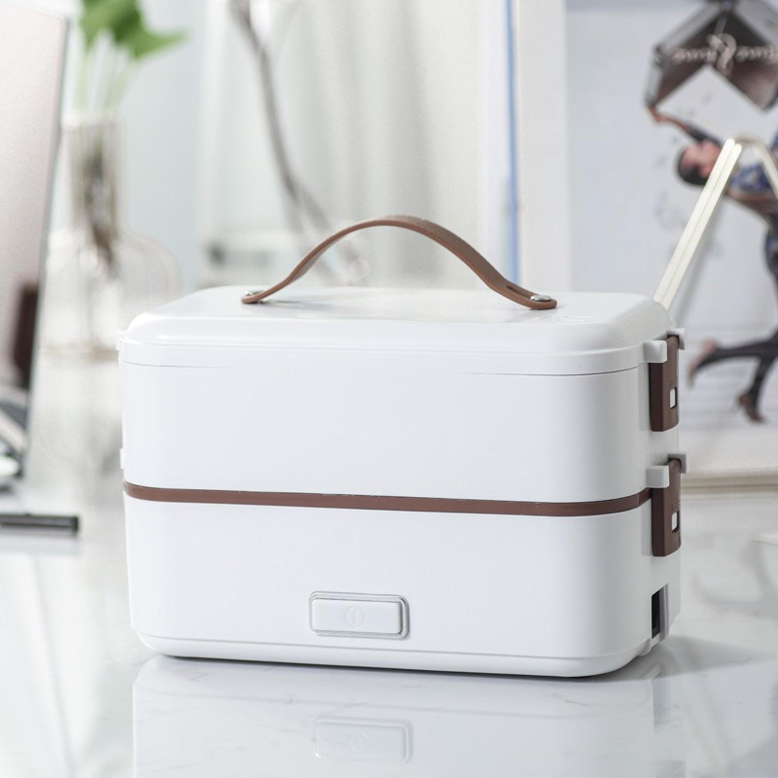Weiße Lunchbox mit braunem Griff und Akzenten. Ein- / Aus-Taste vorne. Heller Hintergrund.