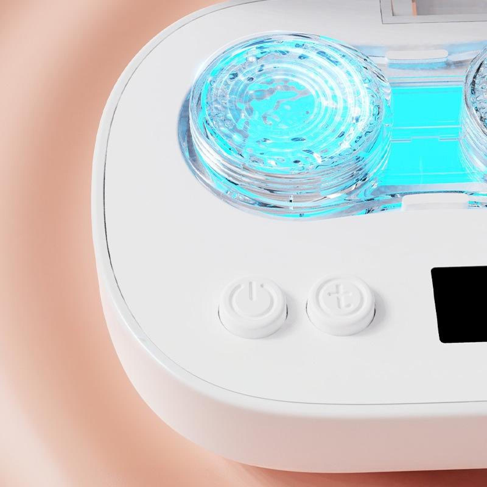 Nahaufnahme eines weißen Geräts mit blau leuchtenden Lichtern. Es hat Knöpfe und einen schwarzen rechteckigen Bildschirm.