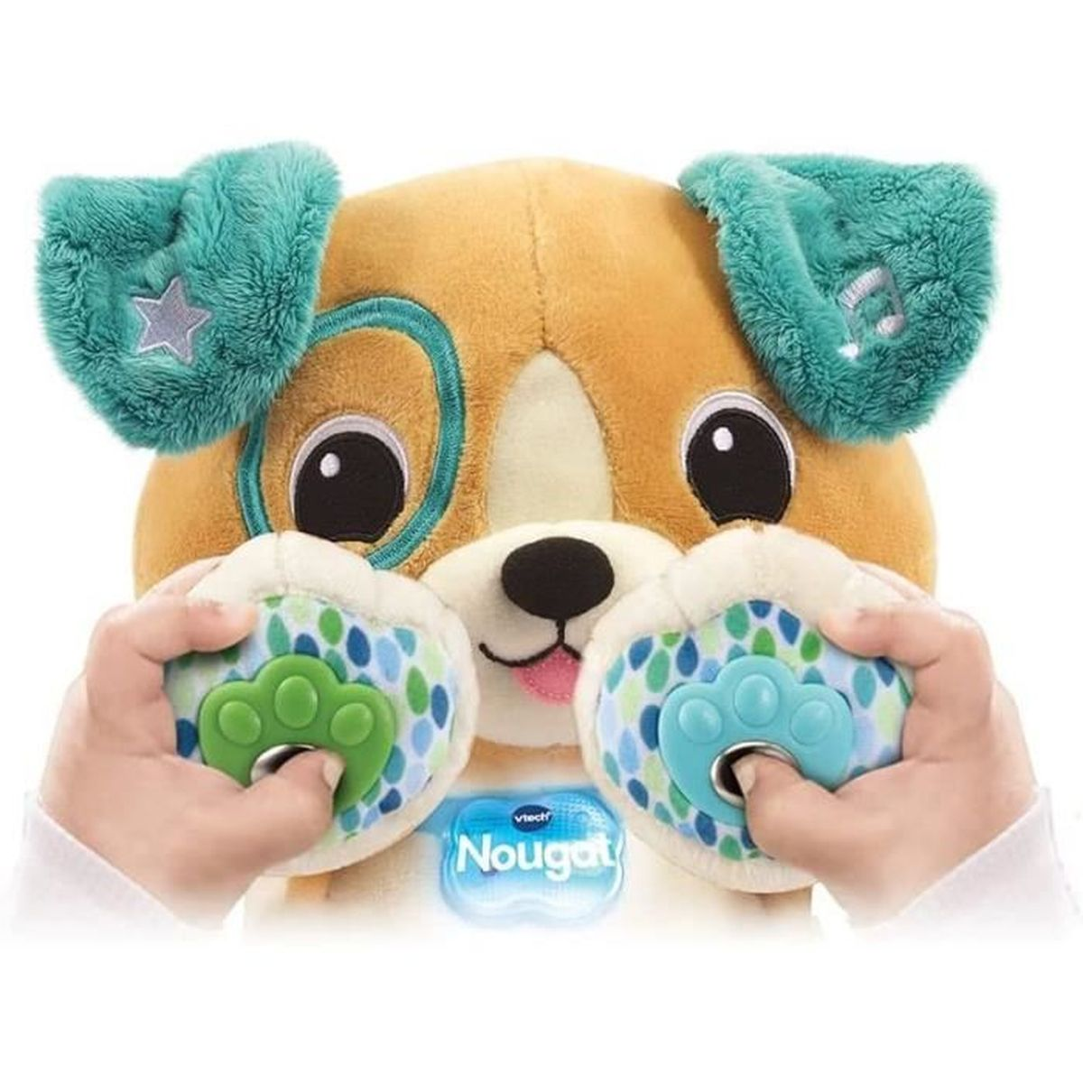 Ein Plüschhundespielzeug mit türkisfarbenen Ohren und Pfotenpolstern. Hände drücken auf die Pfotenpolster. Das Spielzeug ist beige und hat schwarze Augen und eine rosa Zunge.
