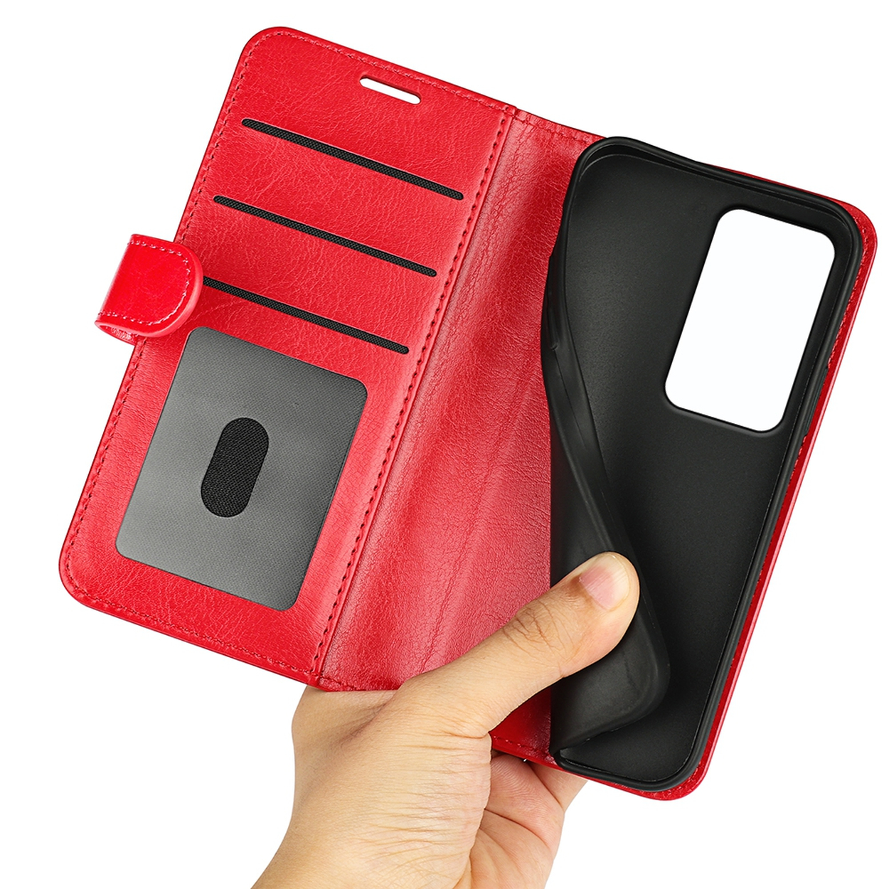 Une main tenant un étui de téléphone rouge. L'étui est ouvert, montrant l'intérieur avec des sections noires et grises. Isolé sur blanc.