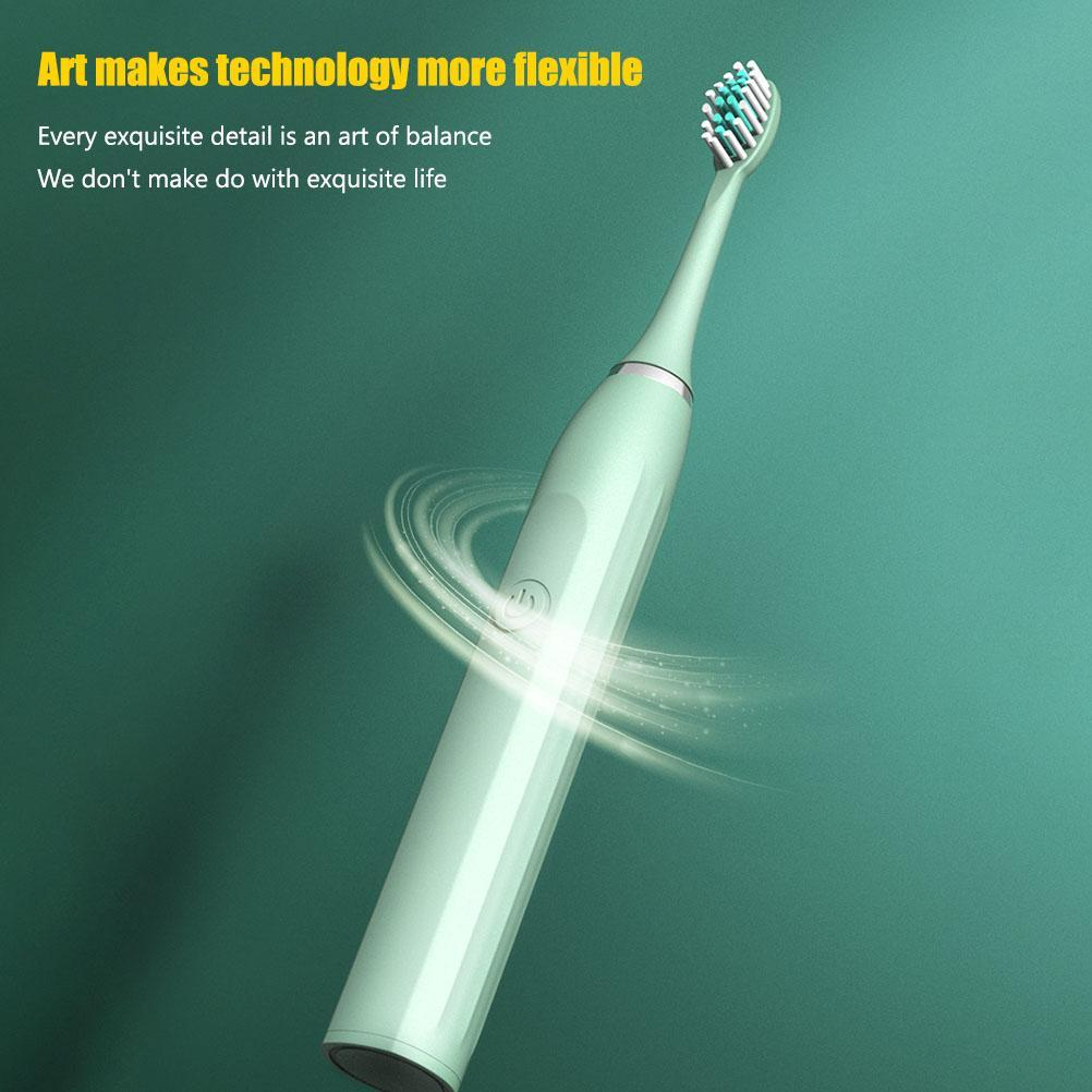 Eine mintgrüne elektrische Zahnbürste wird vor einem dunkelgrünen Hintergrund dargestellt. Über dem Text steht: Kunst macht Technologie flexibler.