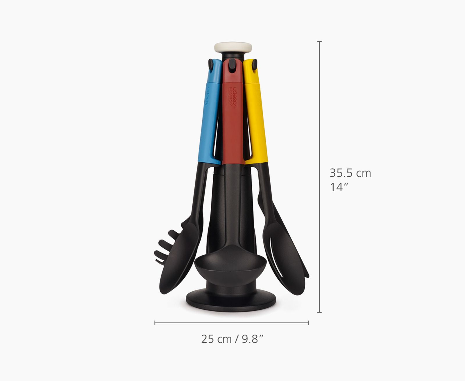 Un juego de utensilios de cocina en un soporte. Los utensilios son negros y los mangos azules, rojos y amarillos.
