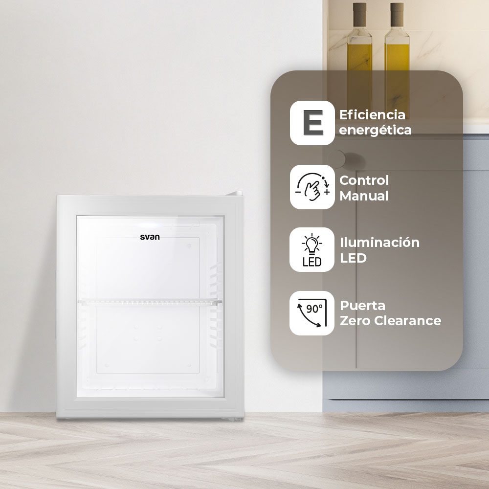 Un mini-refrigerador blanco con la marca 'svan'. Características: eficiencia energética, control manual, iluminación LED y puerta sin separación.