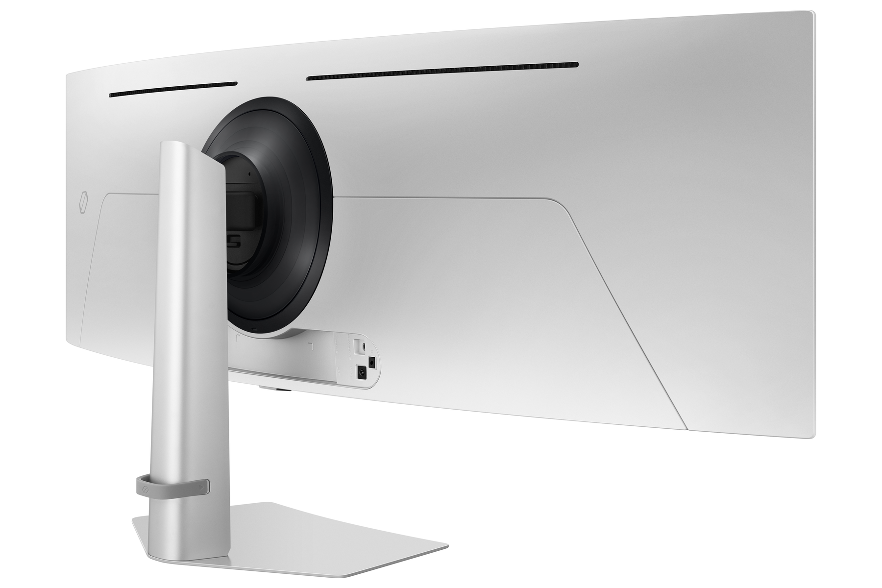 Pokazano tył białego, zakrzywionego monitora. Ma okrągły środek i podstawkę. Widoczne są porty. Design jest elegancki i nowoczesny.