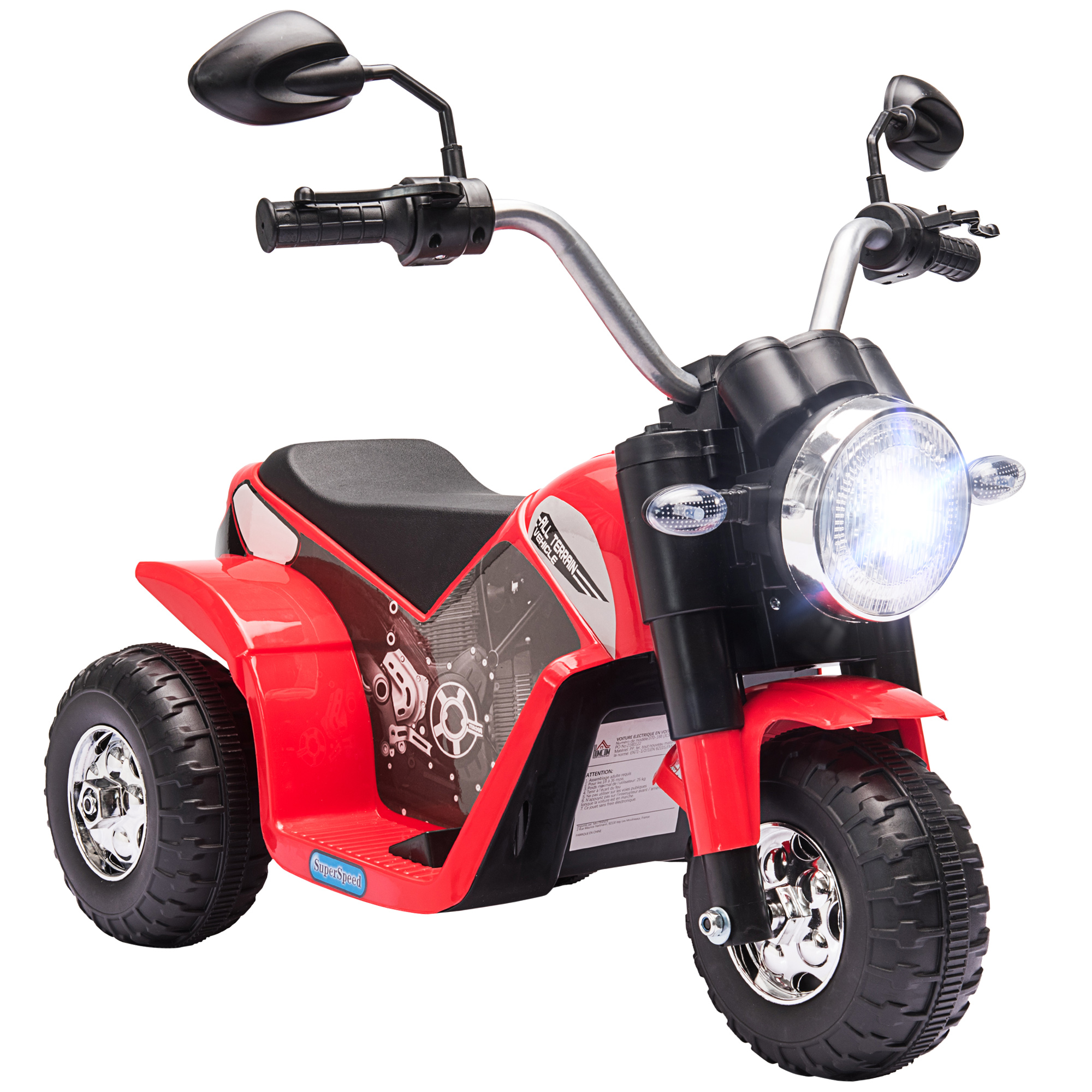 Una moto giocattolo rossa e nera con un faro luminoso e tre ruote, isolata su bianco.