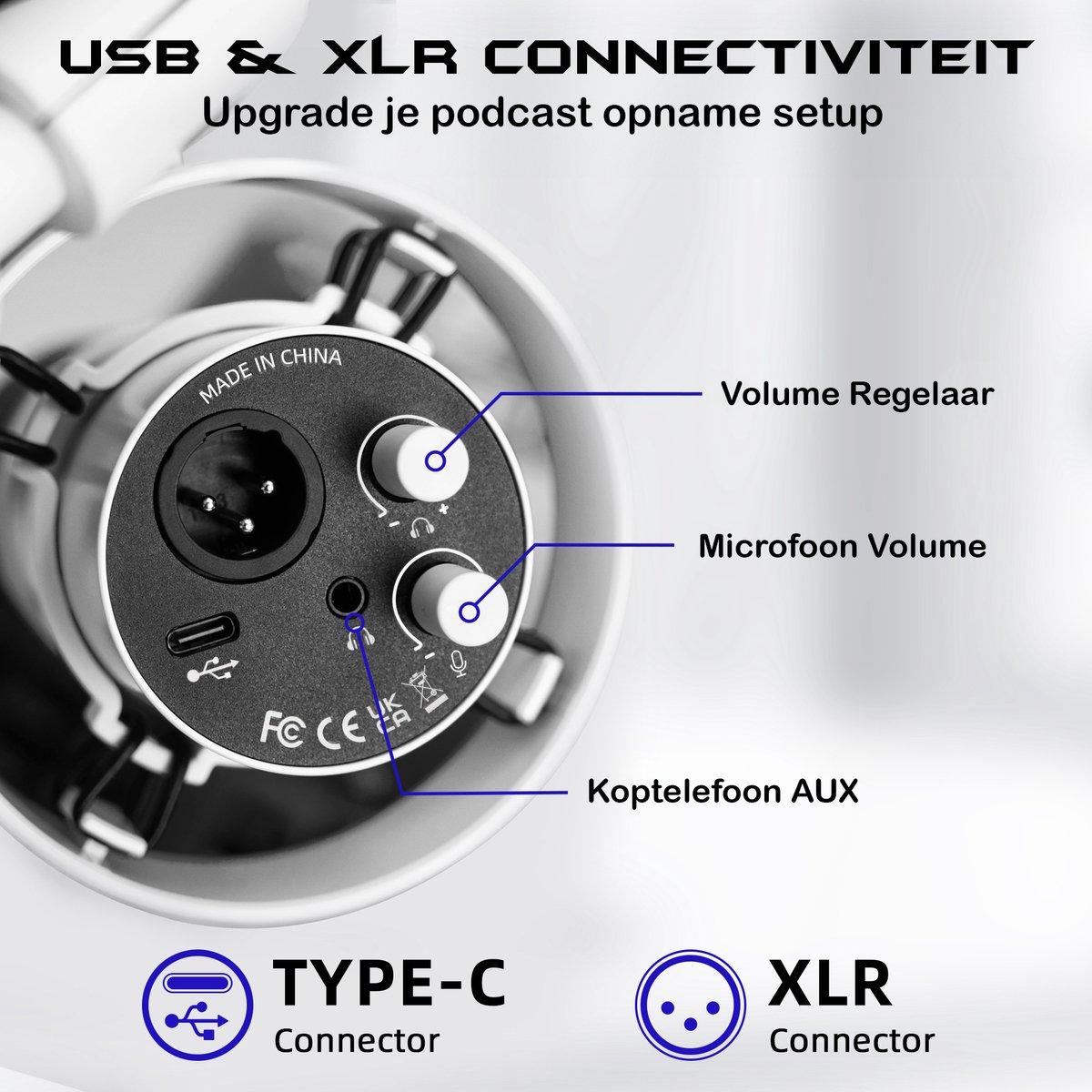 Close-up van een zwart en zilver audioapparaat met gelabelde bedieningselementen voor volume, microfoon en koptelefoon aux. USB & XLR connectoren zijn afgebeeld.
