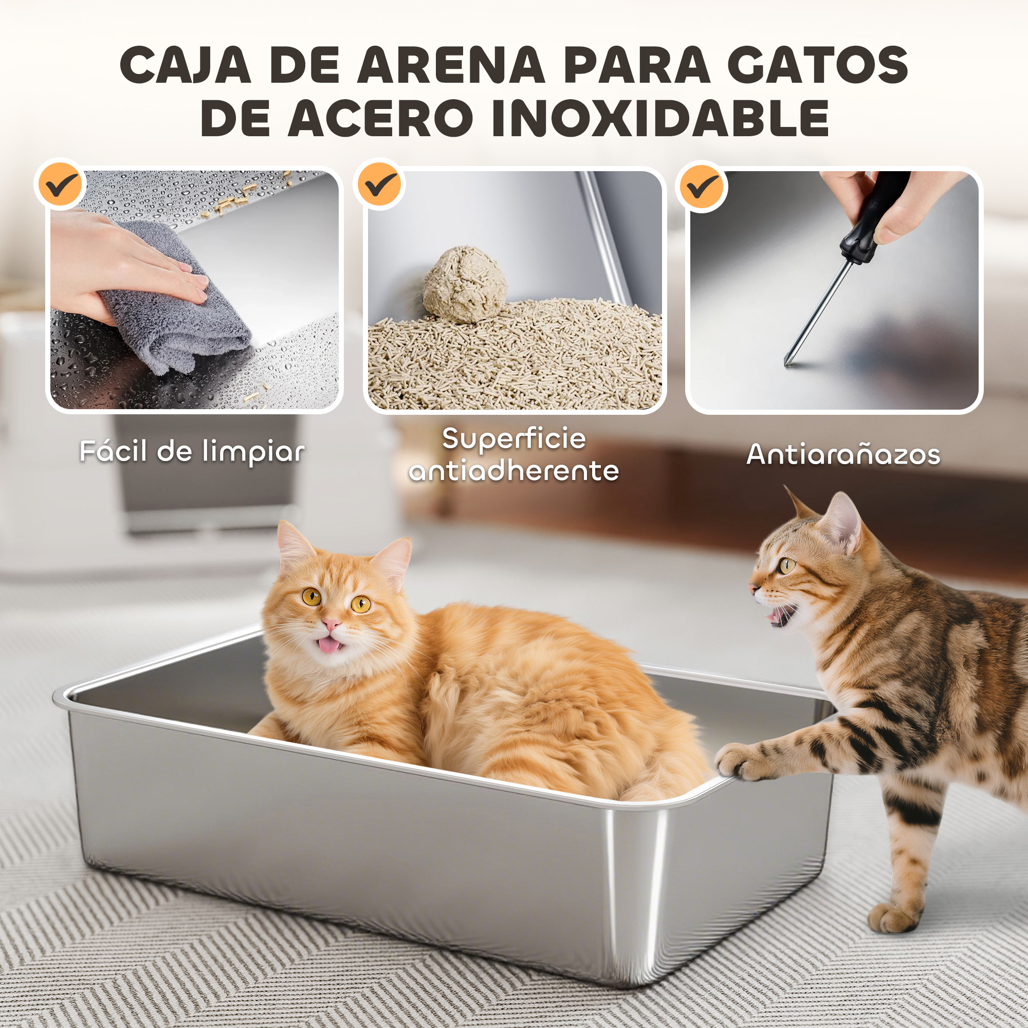 Una caja de arena metálica para gatos con dos gatos. Un gato naranja está dentro de la caja. Otro gato atigrado está al lado.