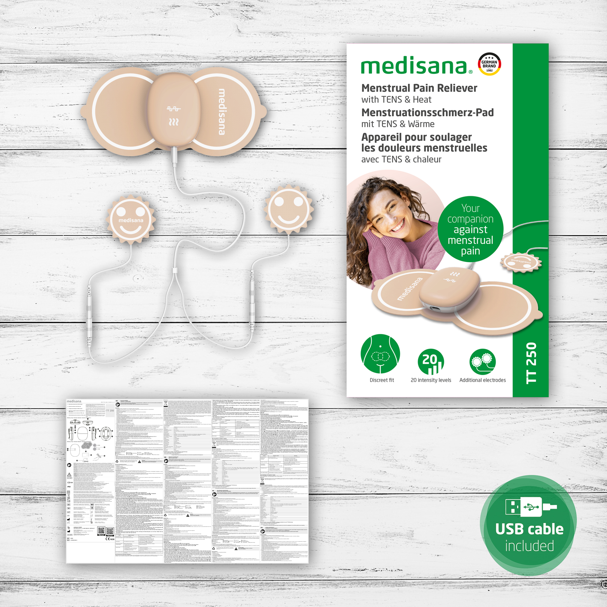 Das Bild zeigt ein Menstruationsschmerzmittel von medisana, Verpackung und eine Frau. Das Gerät ist beige und hat ein Smiley-Gesicht.