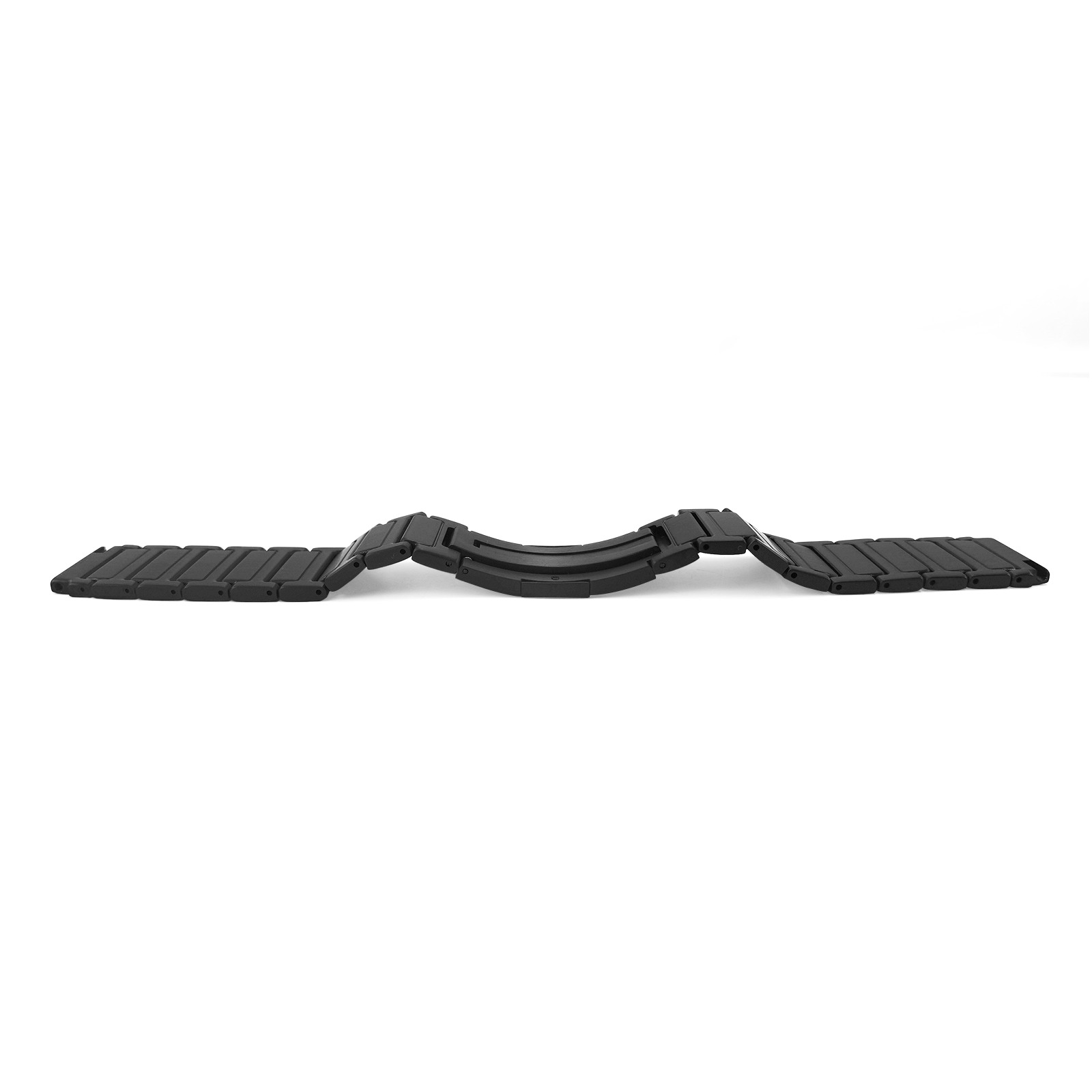 Ein gebogenes schwarzes Uhrenarmband liegt auf einer weißen Oberfläche. Es besteht aus Gliedern.