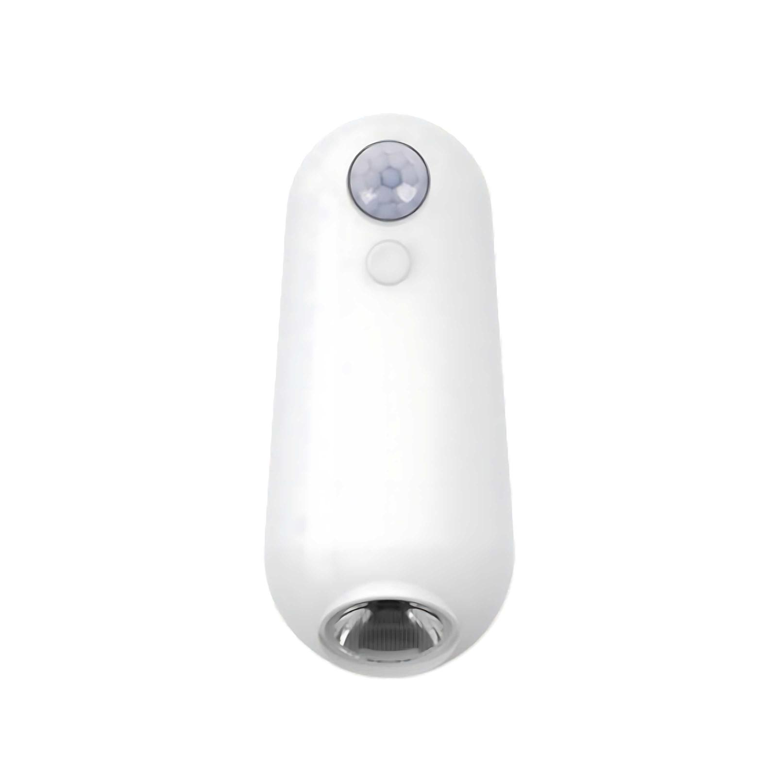 Ein weißes, längliches Gerät mit Sensor und Licht. Es befindet sich auf weißem Hintergrund.