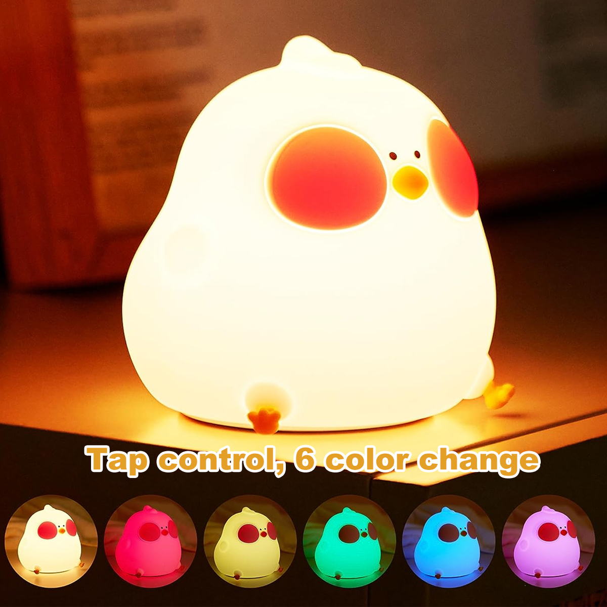 Eine weiße Kükenförmige Lampe mit roten Wangen, gelbem Schnabel und einer Reihe von Farbwechseloptionen darunter. Text: "Tap control, 6 color change".