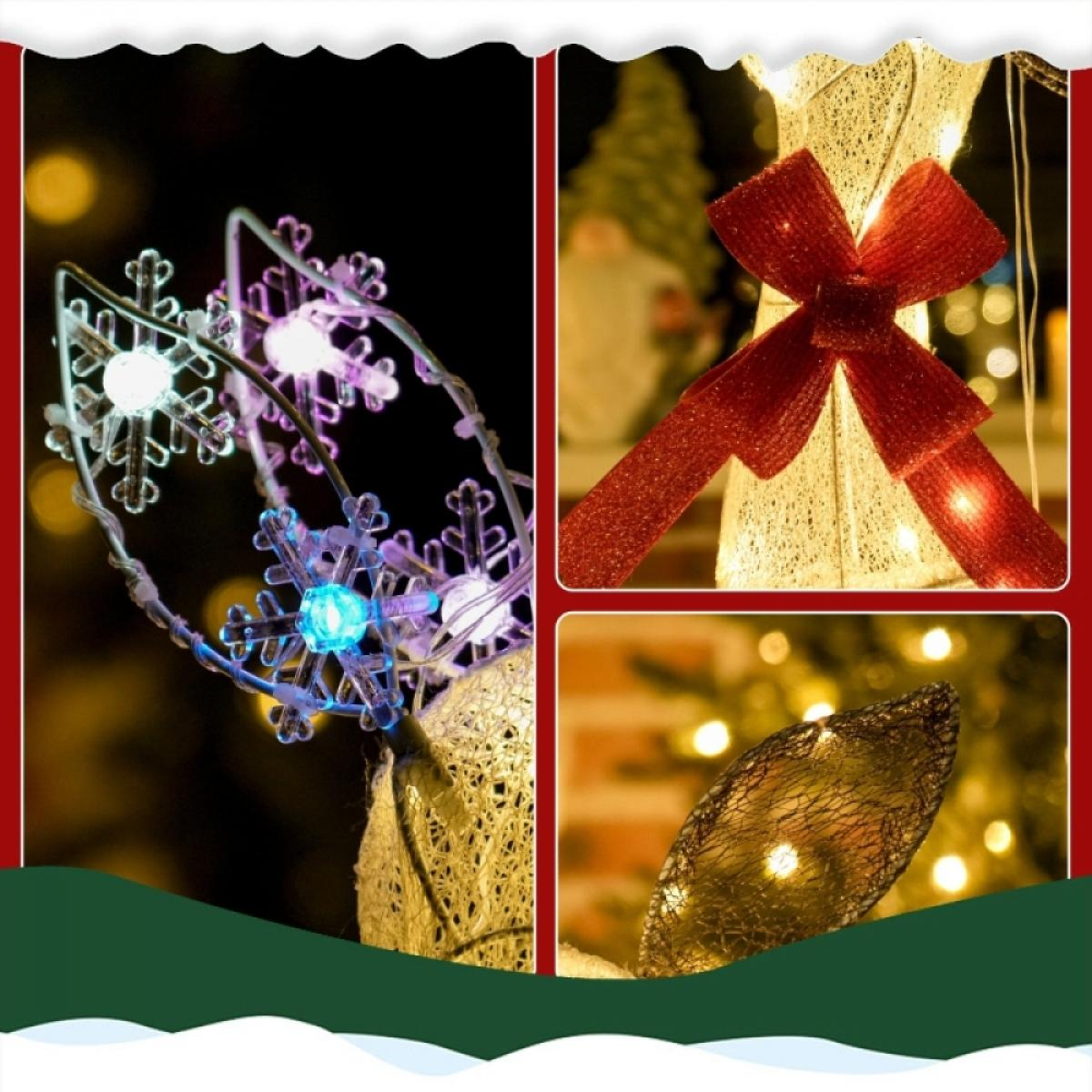 Weihnachtsdekorationen: Schneeflockenlichter, eine beleuchtete Schleife und ein goldfarbenes blattförmiges Licht. Festliche Szene.