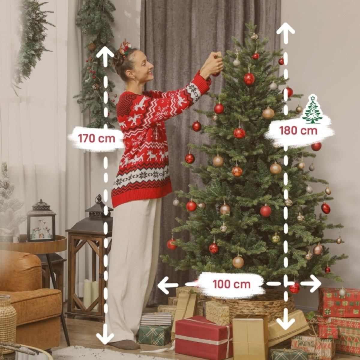 Eine Frau schmückt einen Weihnachtsbaum mit roten Ornamenten. Geschenke umgeben die Basis. Maße markieren Höhe und Breite.