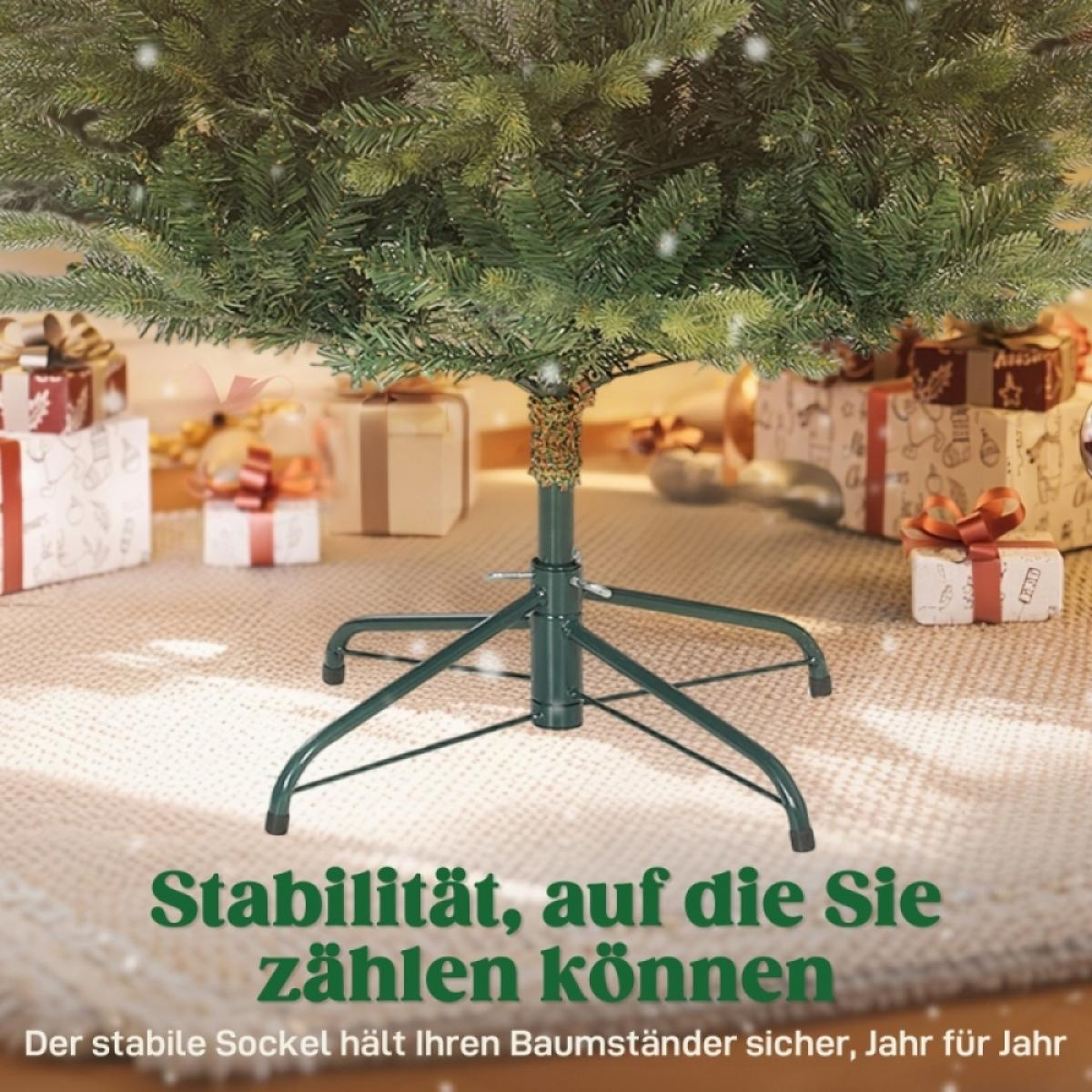 Ein grüner Weihnachtsbaum steht auf einem grünen Metallsockel. Geschenkboxen befinden sich im Hintergrund. Text: "Stabilität, auf die Sie zählen können".