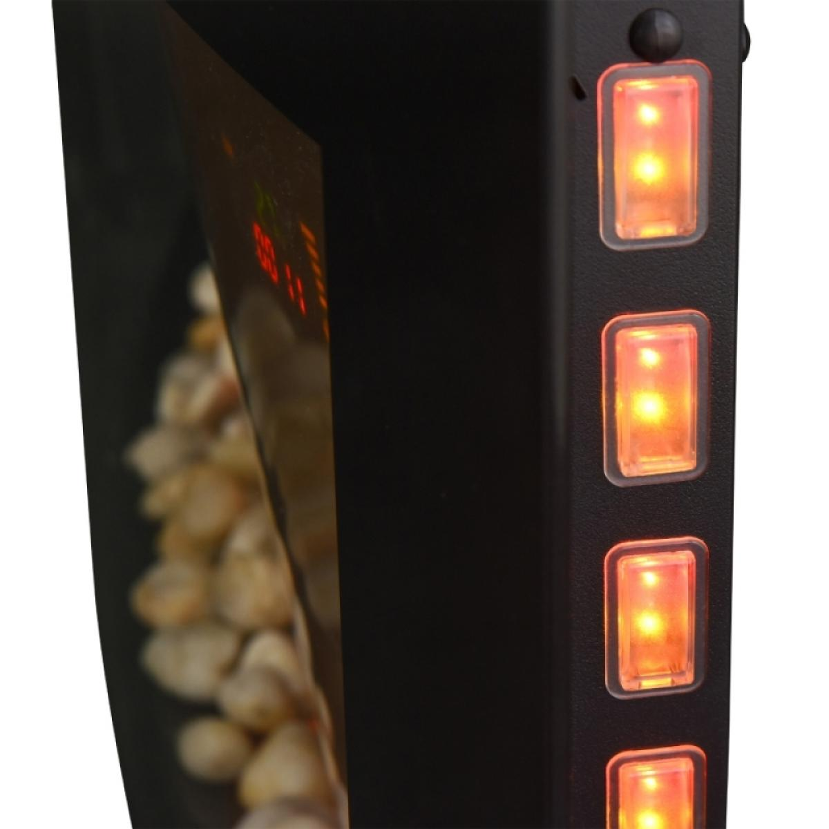 Nahaufnahme einer schwarzen Maschine mit orangefarbenen Lichtern und einem Display mit Zahlen. Popcorn ist im Inneren der Maschine sichtbar.