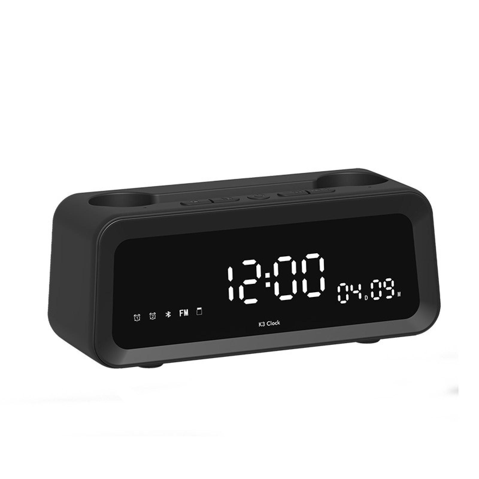 Schwarze K3-Uhr zeigt 12:00 und 04.09 an. Sie hat ein abgerundetes Design mit zwei oberen Löchern. Symbole sind sichtbar.