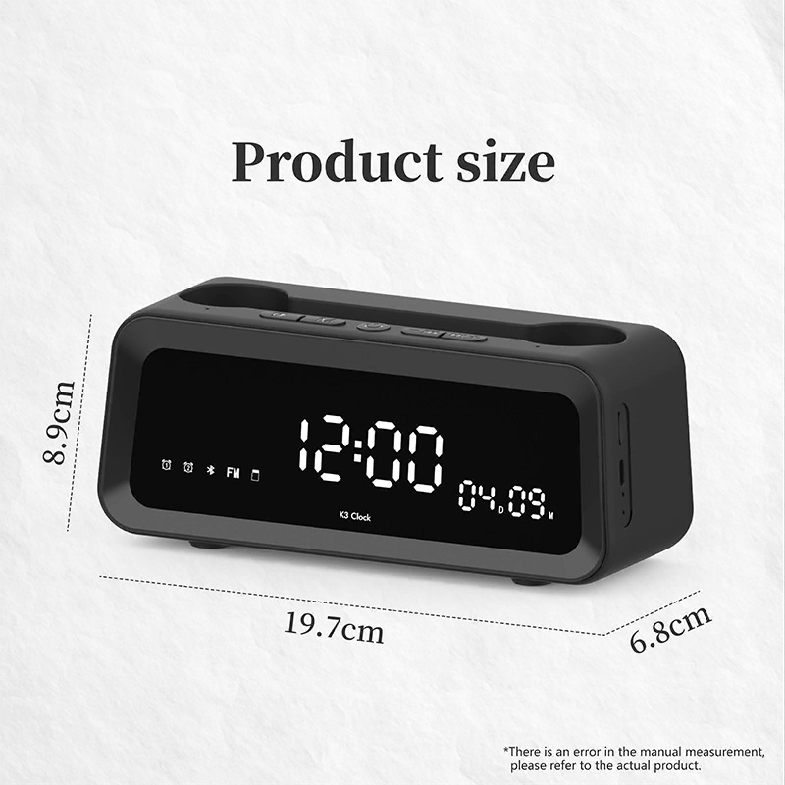 Schwarze Digitaluhr zeigt 12:00 und 04.09. Abmessungen: 19,7 cm, 8,9 cm und 6,8 cm.