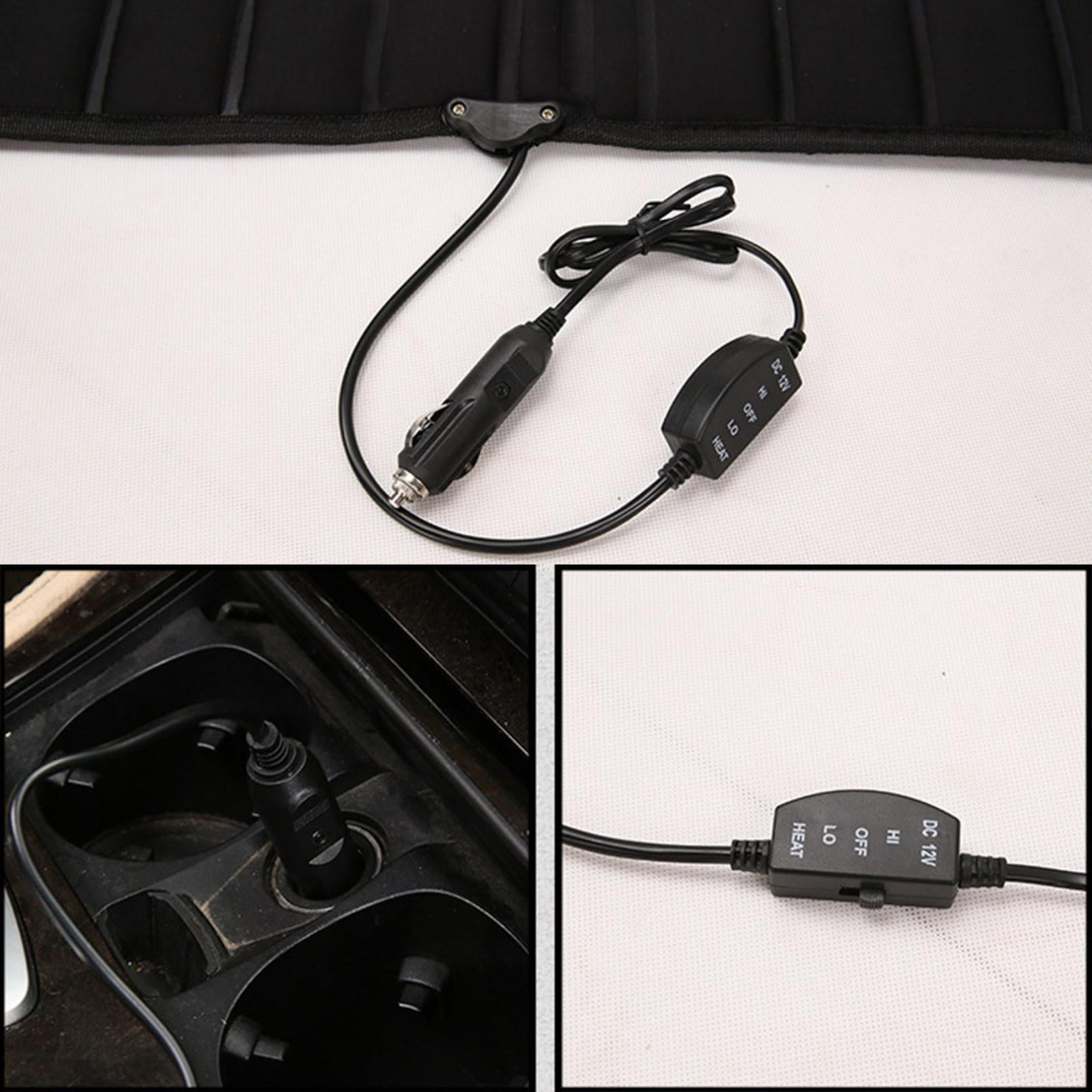 Eine Autositzheizung mit einem DC 12V-Adapter. Das Bild zeigt eine Nahaufnahme der Heizungssteuerung und der Steckdose des Autos.