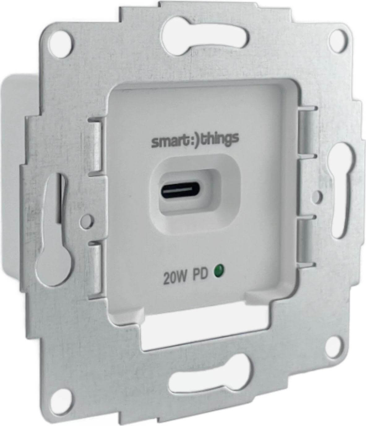 Ein weißes Smart-Things-Gerät mit USB-C-Anschluss, grüner LED und 20W PD-Aufschrift in einem Metallrahmen.