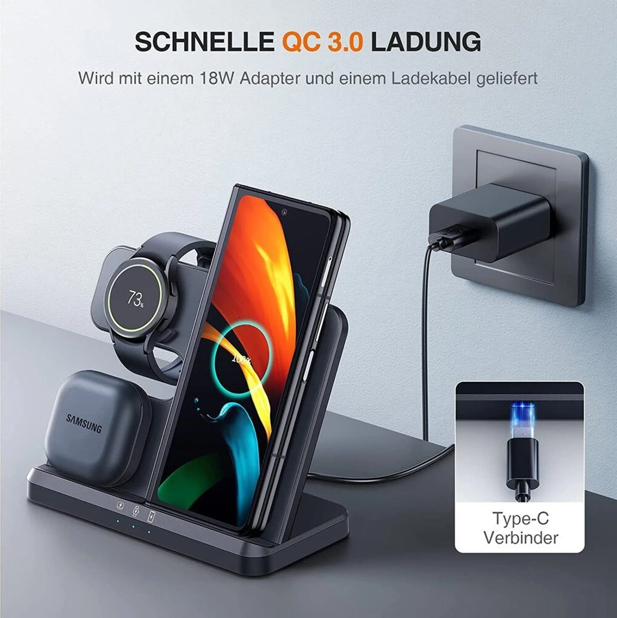 Eine Ladestation mit Telefon, Uhr und Ohrhörern. Ein Ladegerät ist an der Wand eingesteckt. Zeigt 73 % und 100 % an.