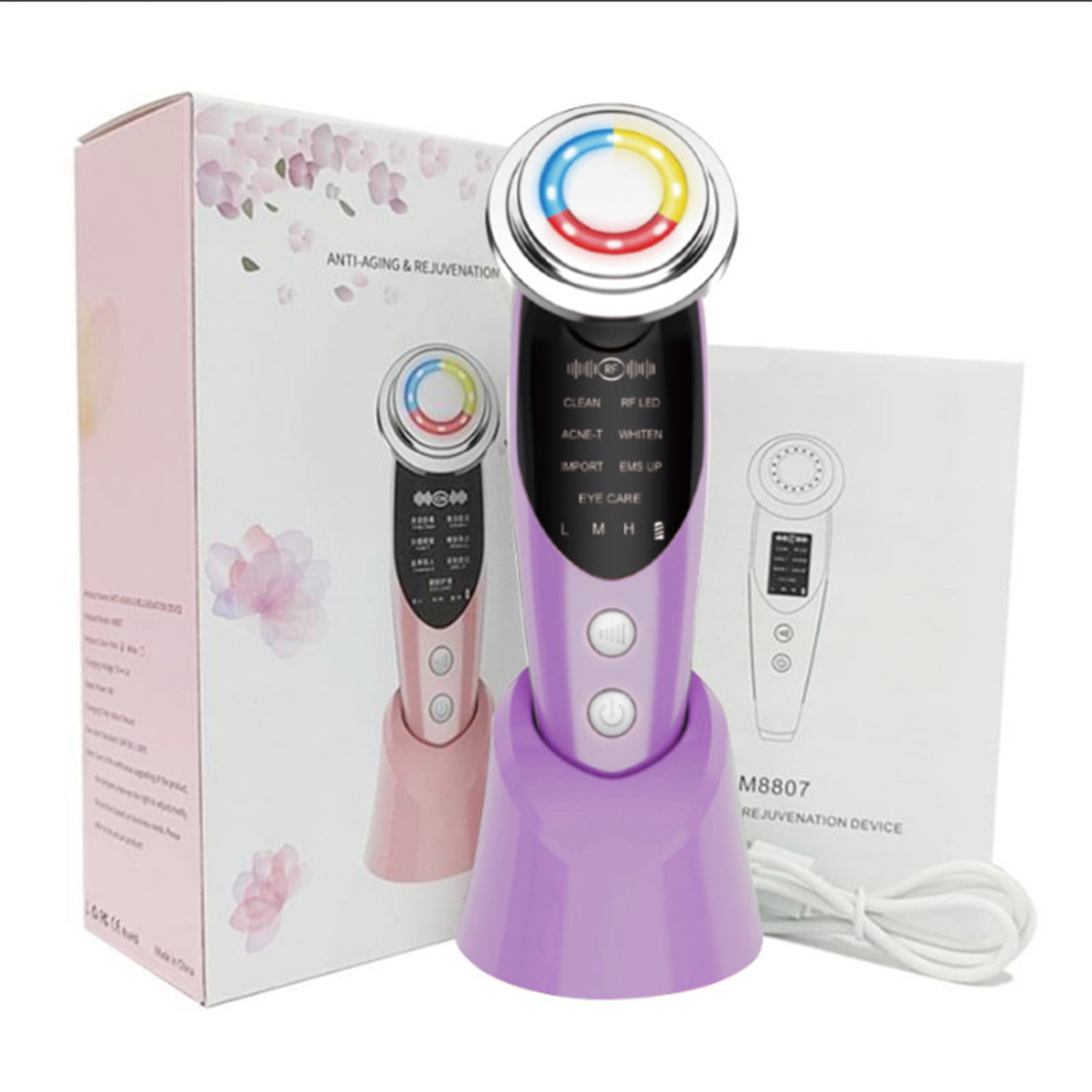 Ein Gesichtsverjüngungsgerät mit rosa und lila Basis. Es hat eine Box und eine Anleitung im Hintergrund.