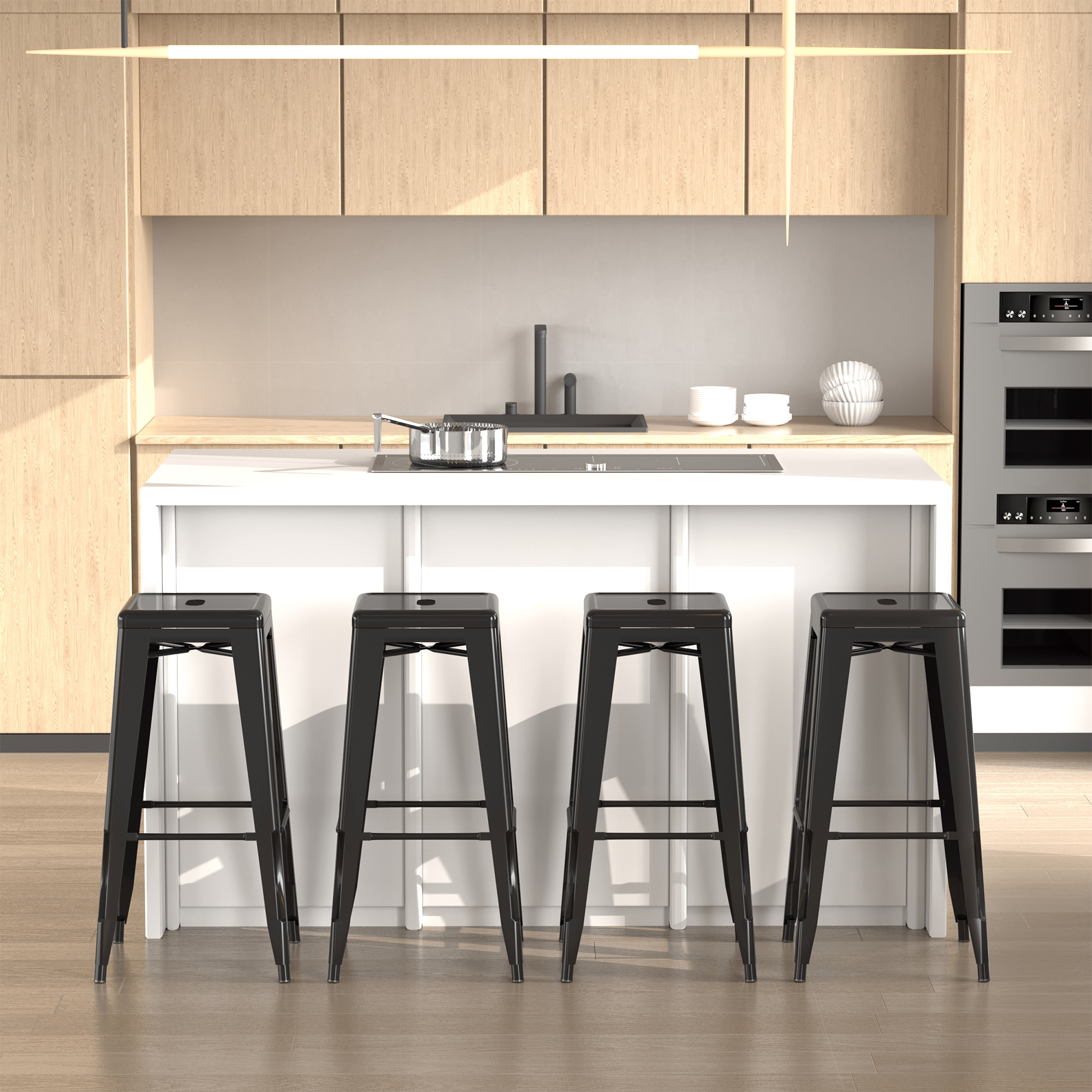 Cocina moderna con taburetes negros. Olla de acero inoxidable en la estufa. Gabinetes y piso de madera clara. Isla blanca.