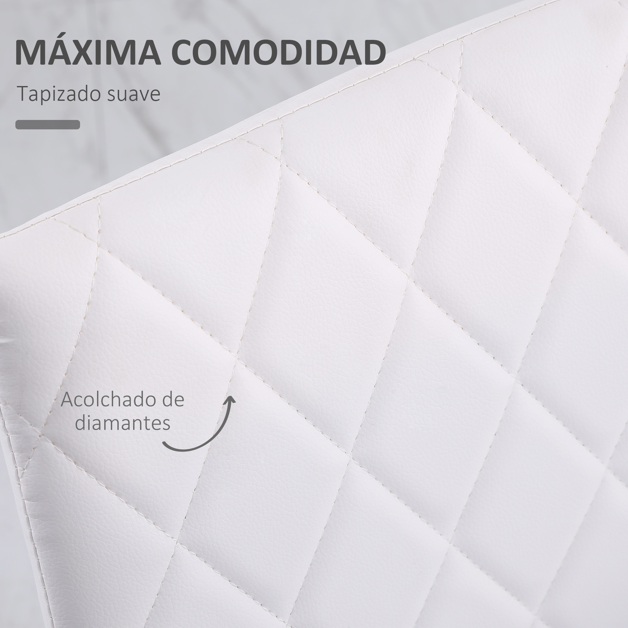Primer plano de una silla blanca con costuras de diamante. La superficie es lisa y acolchada. Texto en español dice 'Máxima comodidad'.