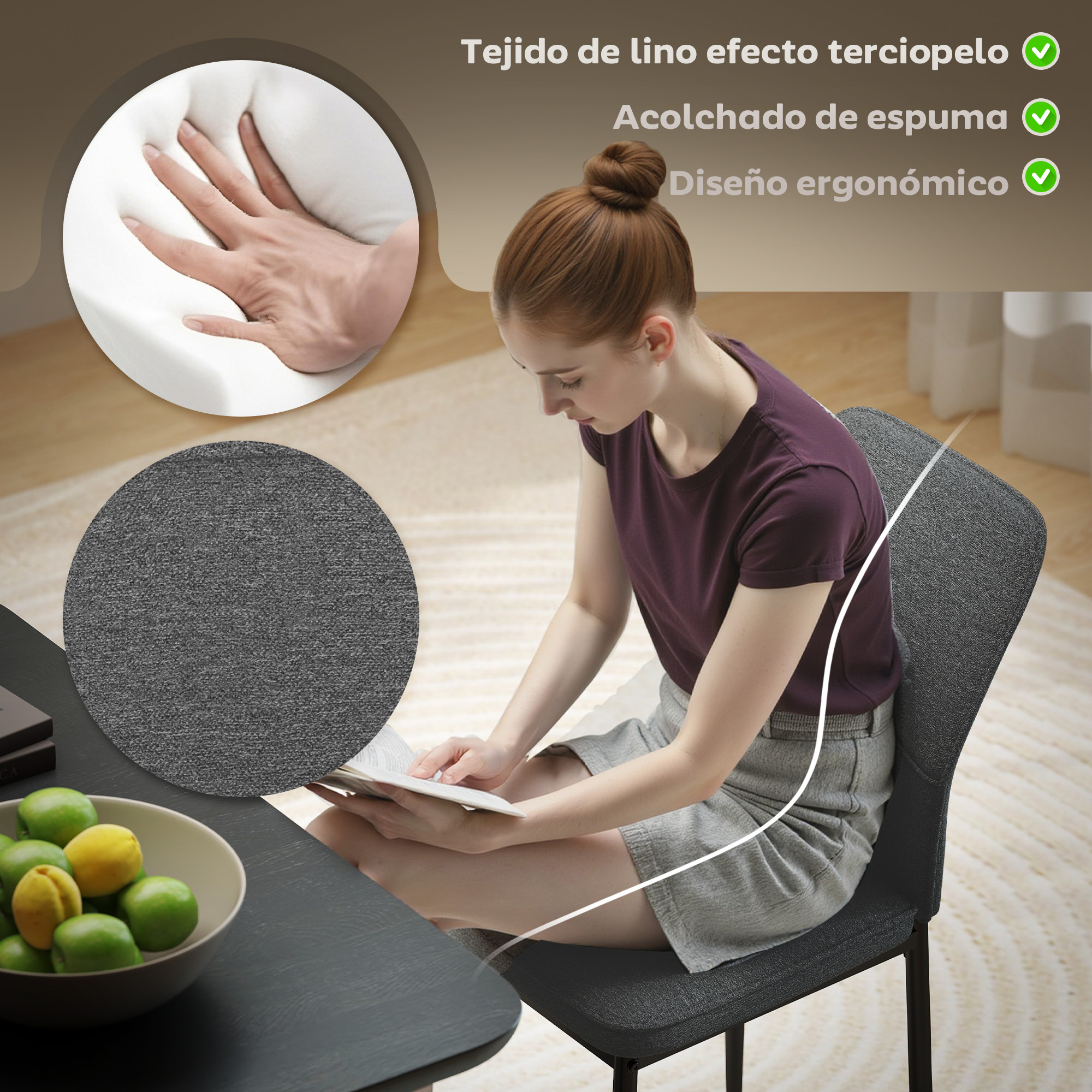 Una mujer lee, sentada en una silla. Se muestran un cuenco de fruta y muestras de tela. La silla tiene asiento gris.