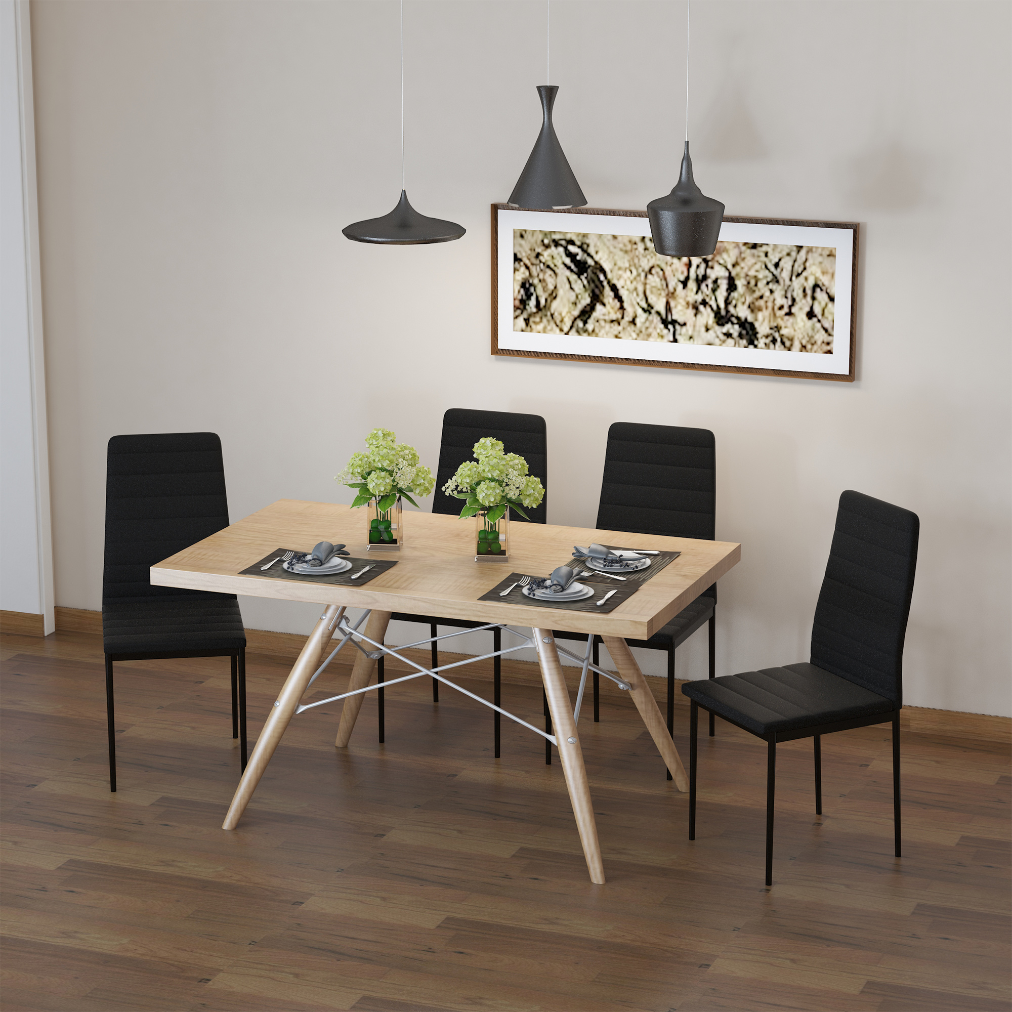 Un comedor con mesa de madera, sillas negras y arte abstracto. Flores en la mesa y lámparas colgantes oscuras arriba.
