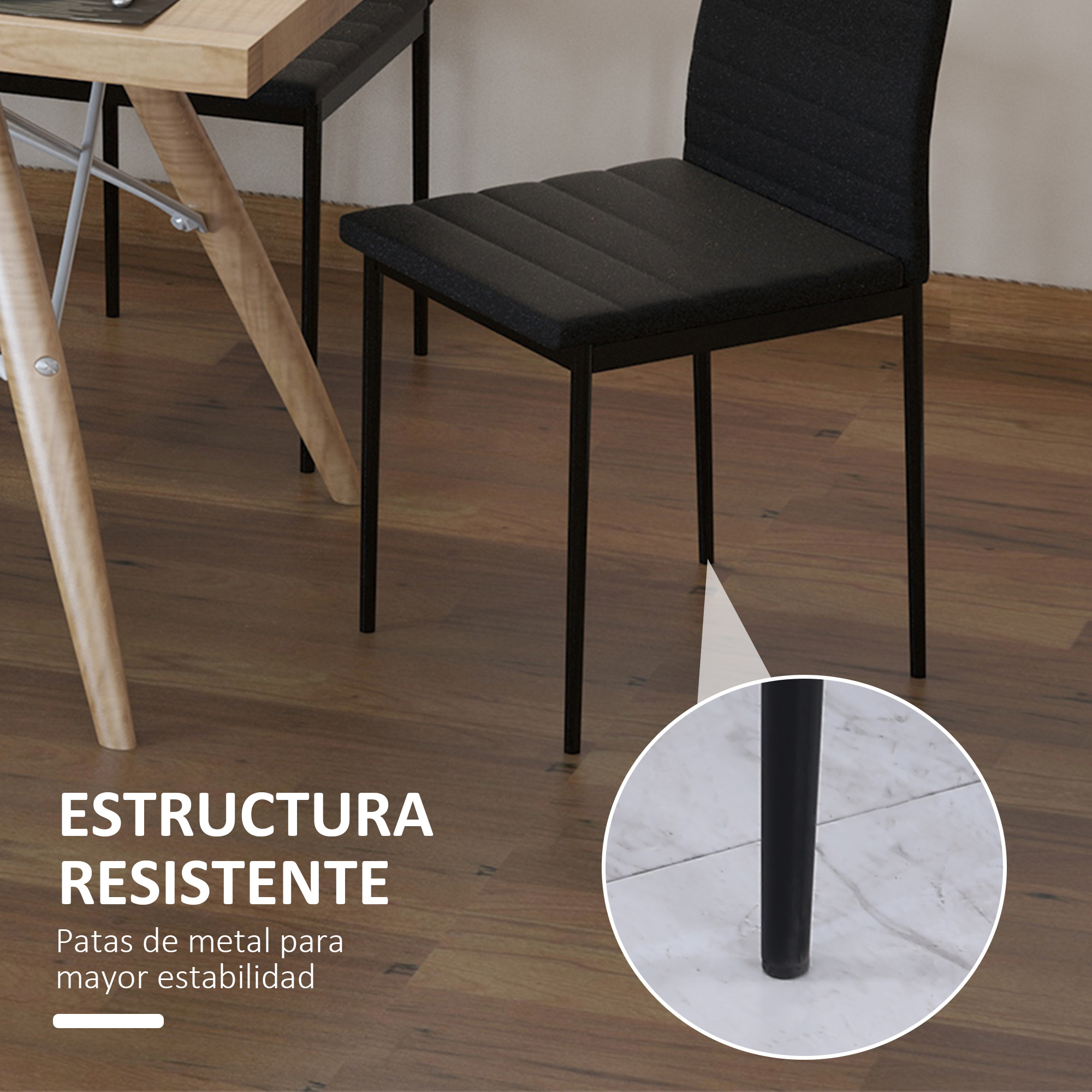 Un juego de comedor con una mesa y sillas. Las sillas tienen marcos y asientos negros. La mesa tiene patas claras.