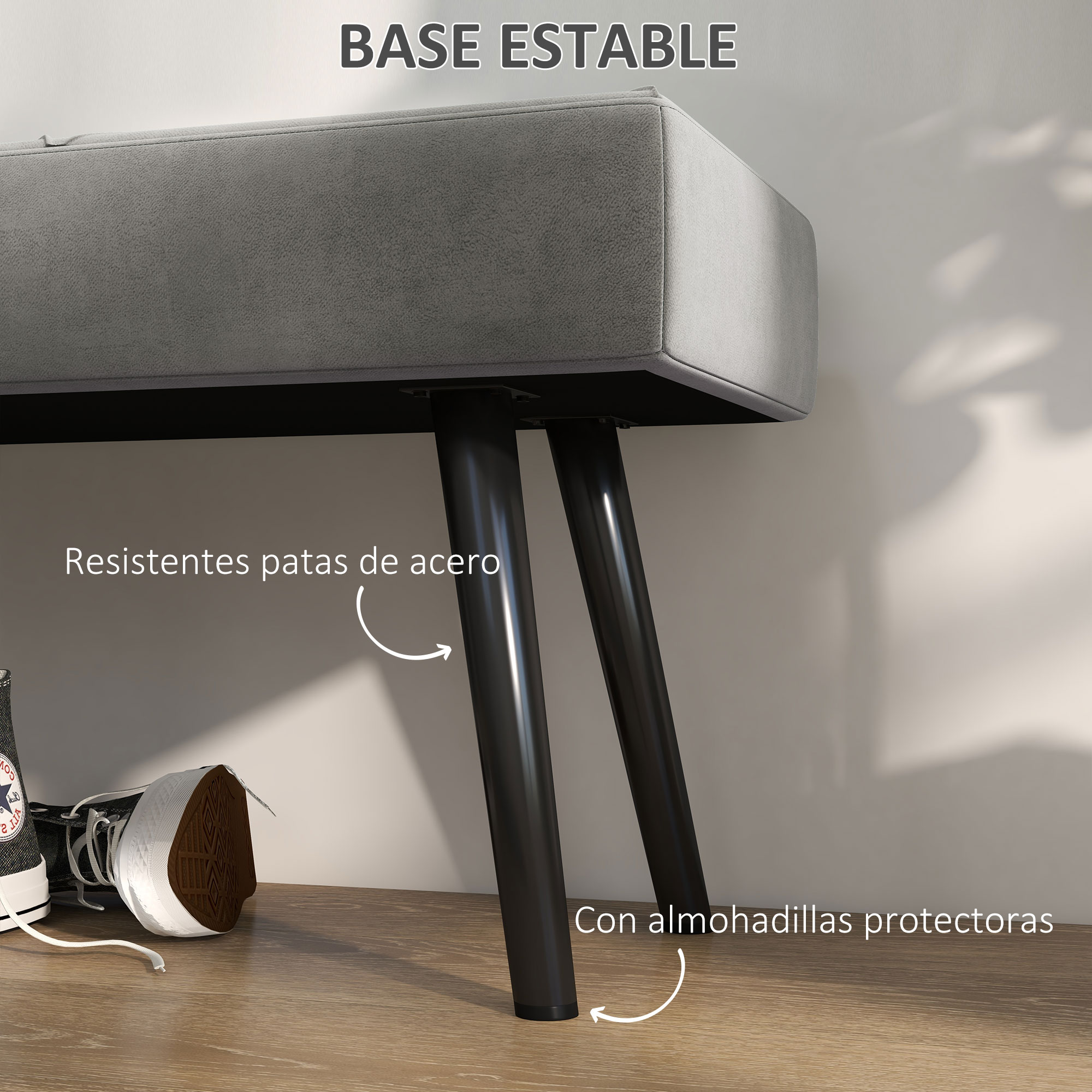 Un banco gris con patas negras. Un par de zapatillas deportivas están en el suelo. El banco está etiquetado como 'BASE ESTABLE'.