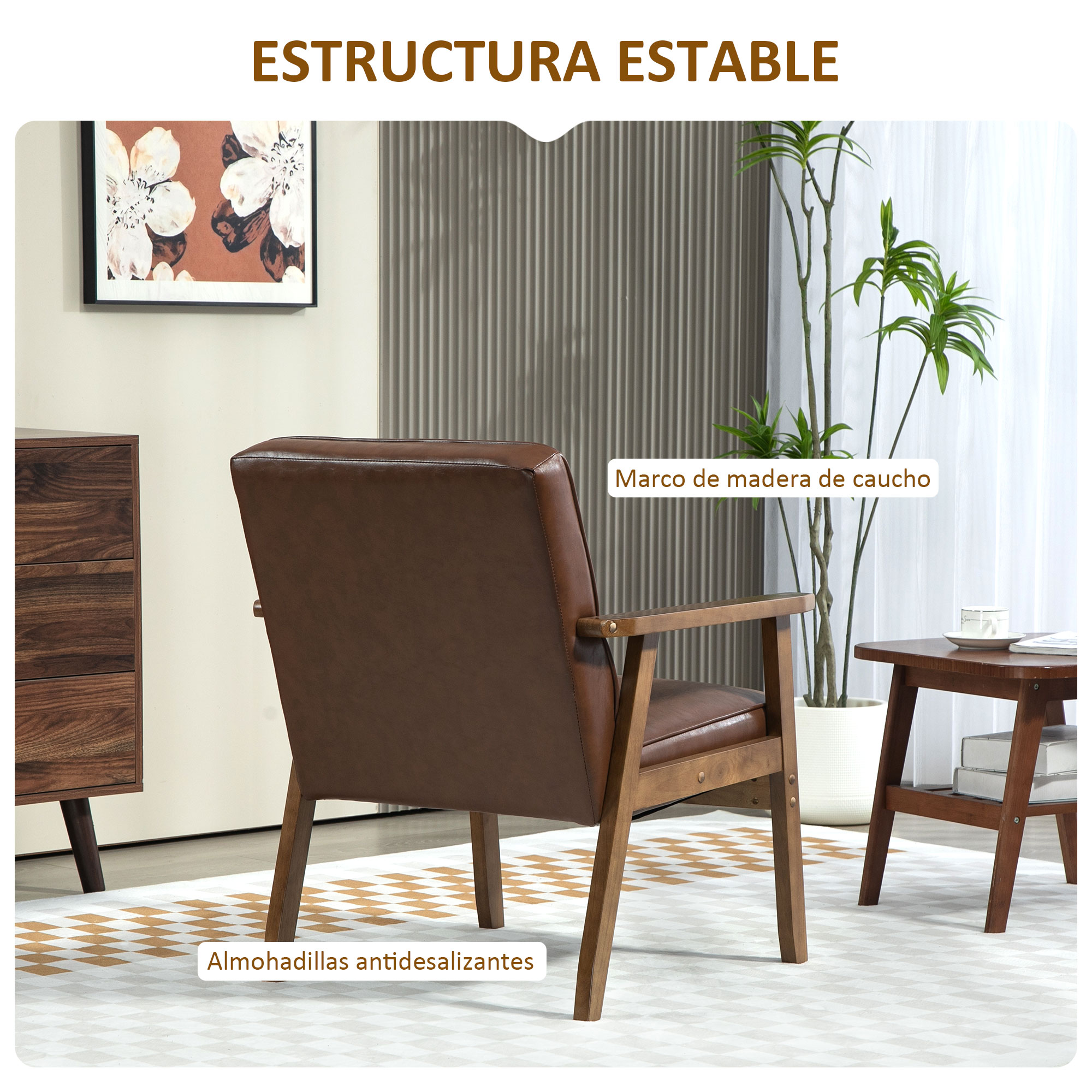 Un sillón de cuero marrón con marco de madera. Los elementos decorativos incluyen una pintura y una planta. El suelo tiene un patrón geométrico.