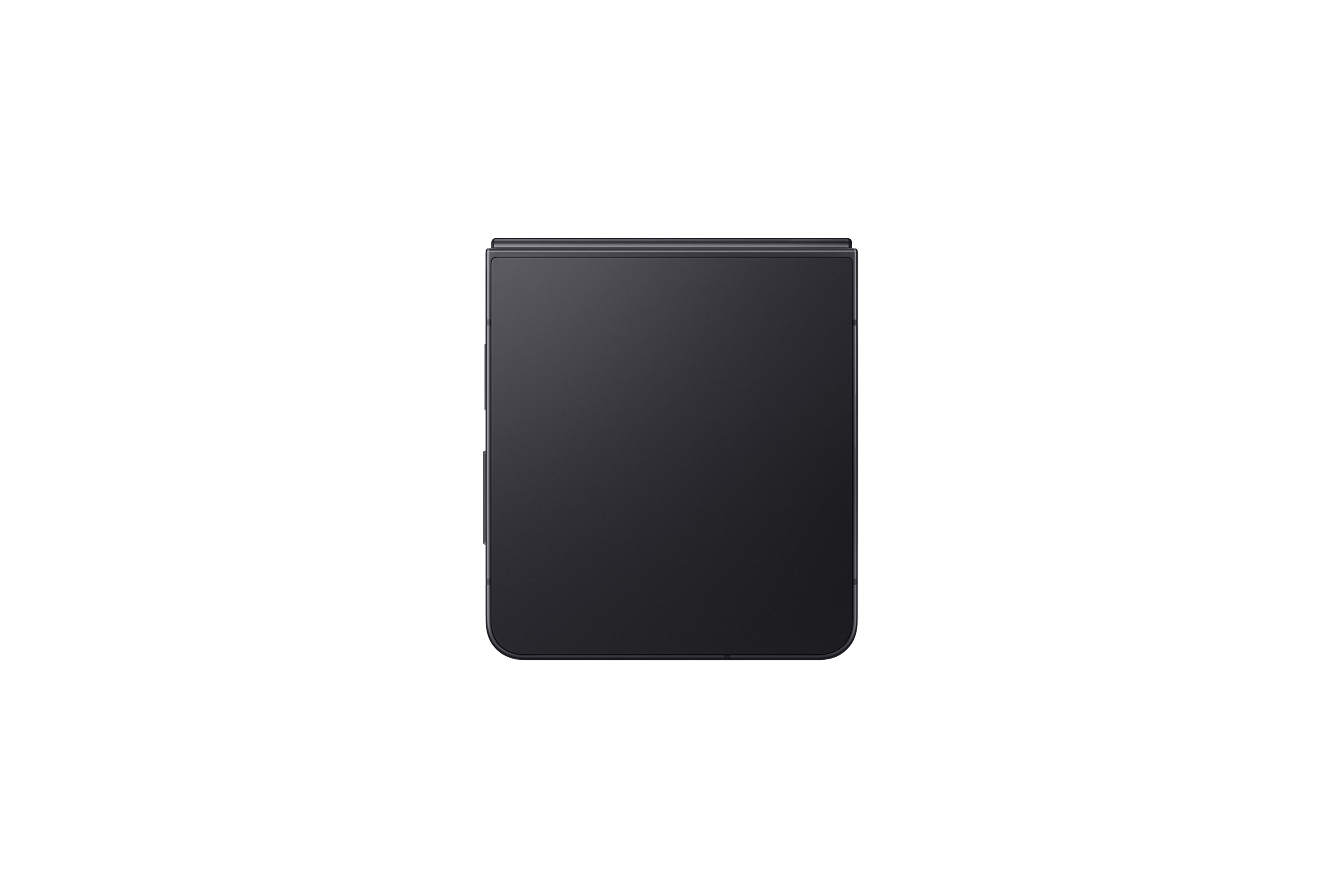 Ciemnoszary, zamknięty telefon składany jest wyśrodkowany na czarnym tle. Telefon jest prostokątny.