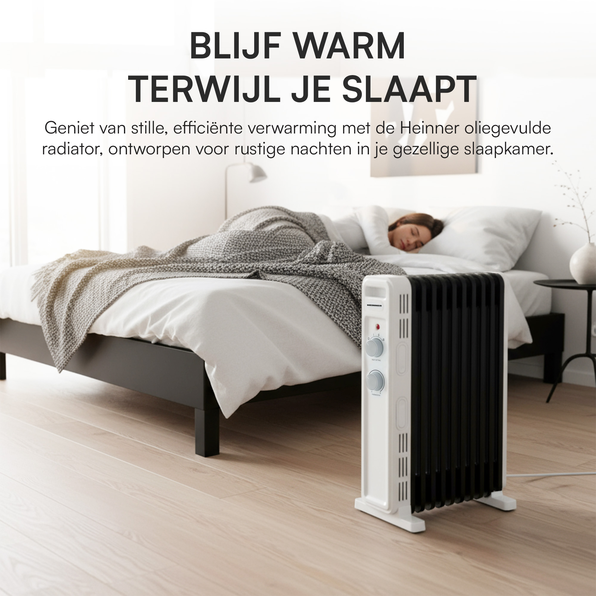 Schlafzimmer mit schlafender Person im Bett und einem weiß-schwarzen Heizkörper rechts.