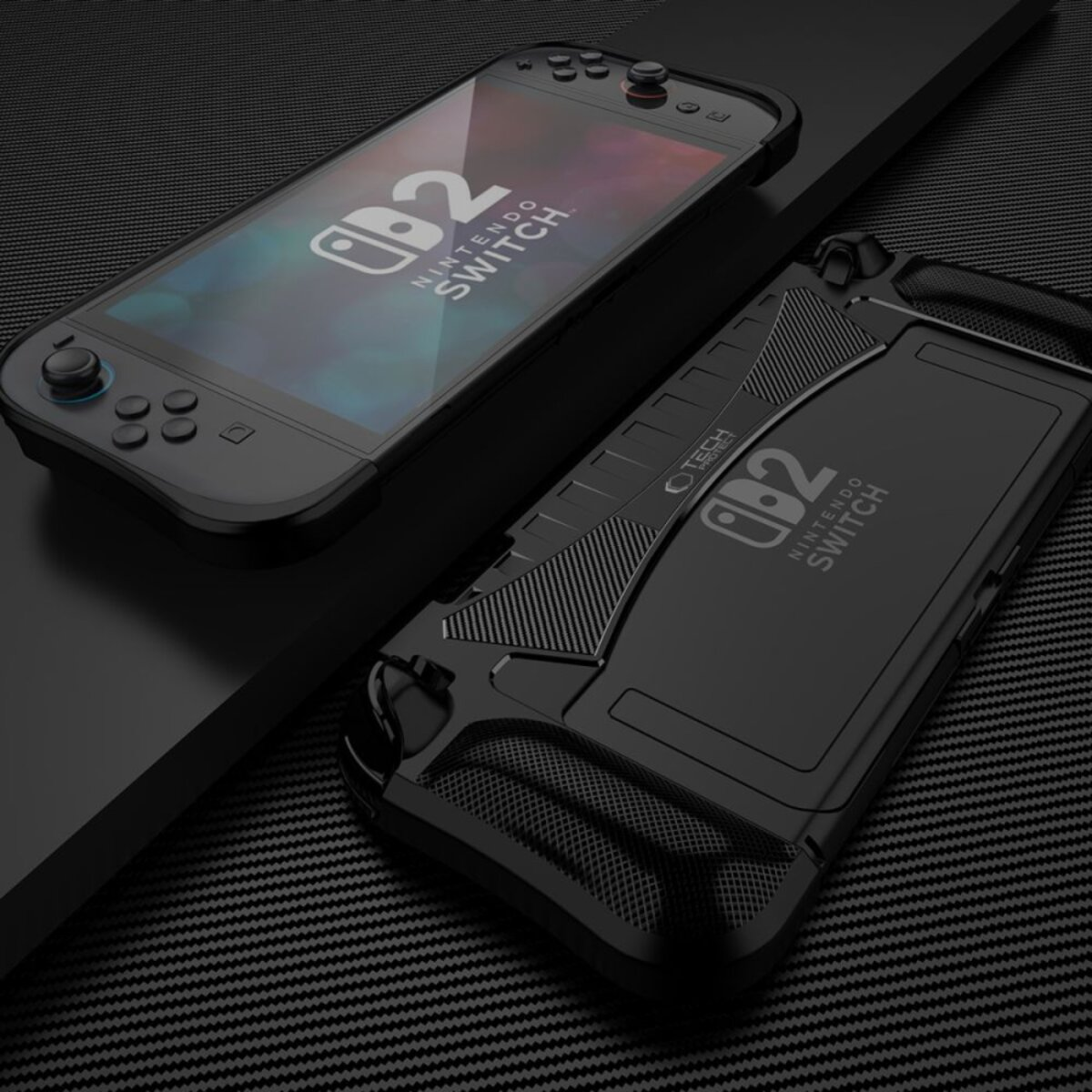 Two black Nintendo Switch consoles and a protective case are displayed against a dark patterned background.